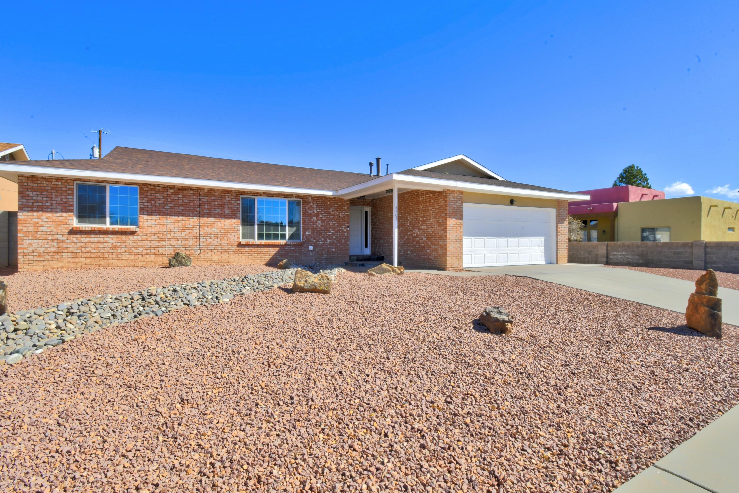 BEAUTIFUL UPDATED HOME IN AN EXCELLENT NW LOCATION!! TASTEFULLY UPDATED!! New Laminate flooring! Newer double pane windows, new kitchen appliances, cabinets, and a huge island with granite countertops! Both bathrooms have been completely remodeled. New refrigerated air and furnace combo! Newer roof and recently painted inside with new doors and trim. This light filled home has 3 bedrooms, 2 baths, and a 2 car garage. plenty of space for the whole family! Front & backyards have SW landscape and a large covered patio with a huge backyard. Great for entertaining with friends and family! Too much to list. Move in ready! NO HOA on almost a quarter acre lot with backyard access! Near breweries, restaurants, and shopping!