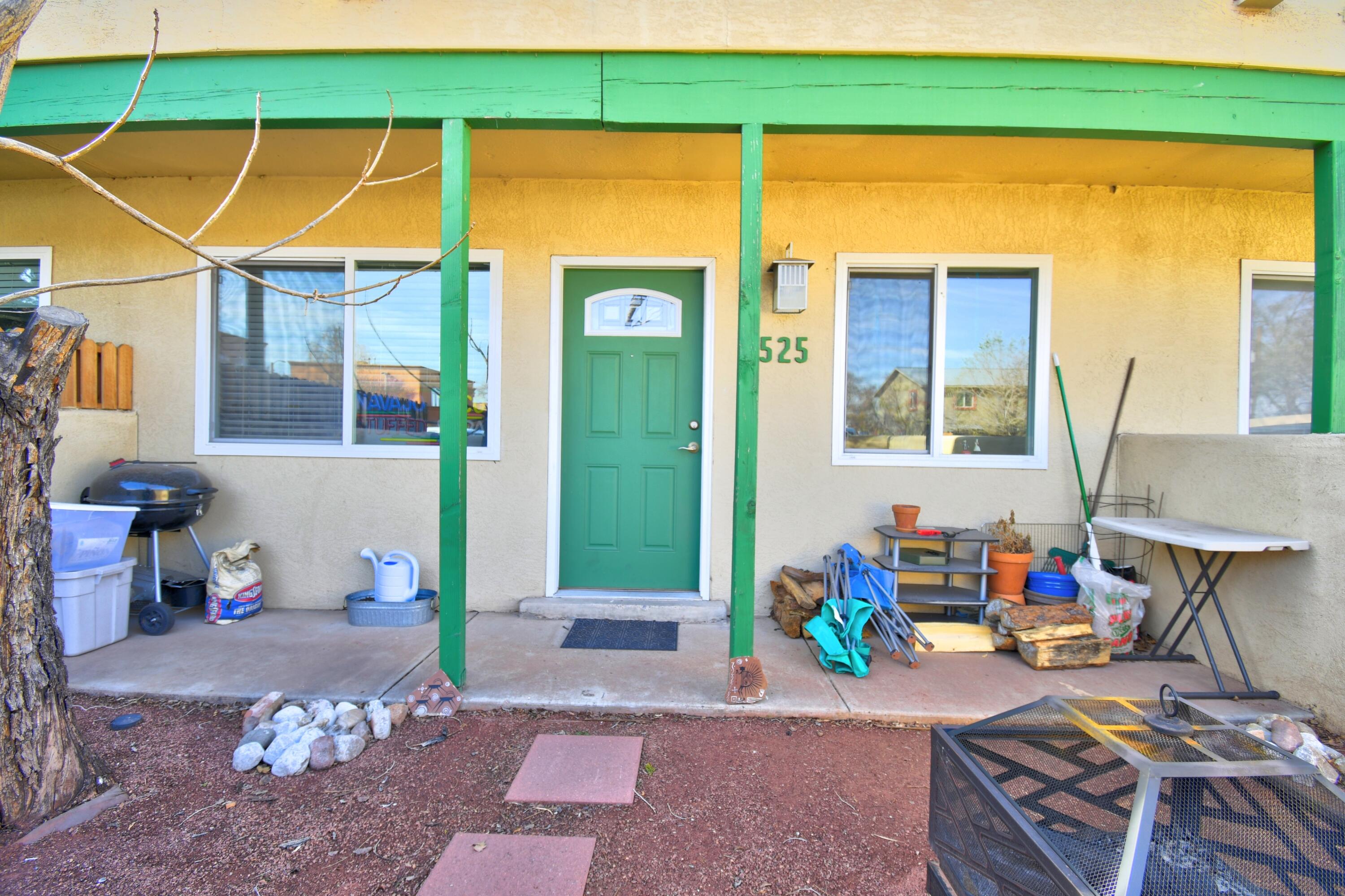 Condo across from Highland High Schooland close to Nob Hill and UNM!  The condo isa one storoy ground floor unit with privatecourtyard and a rear yard with deck.  Updatedkitchen and bathroom.  HOA covers roof, AC,heat, water and exterior.  New roof in 2020.