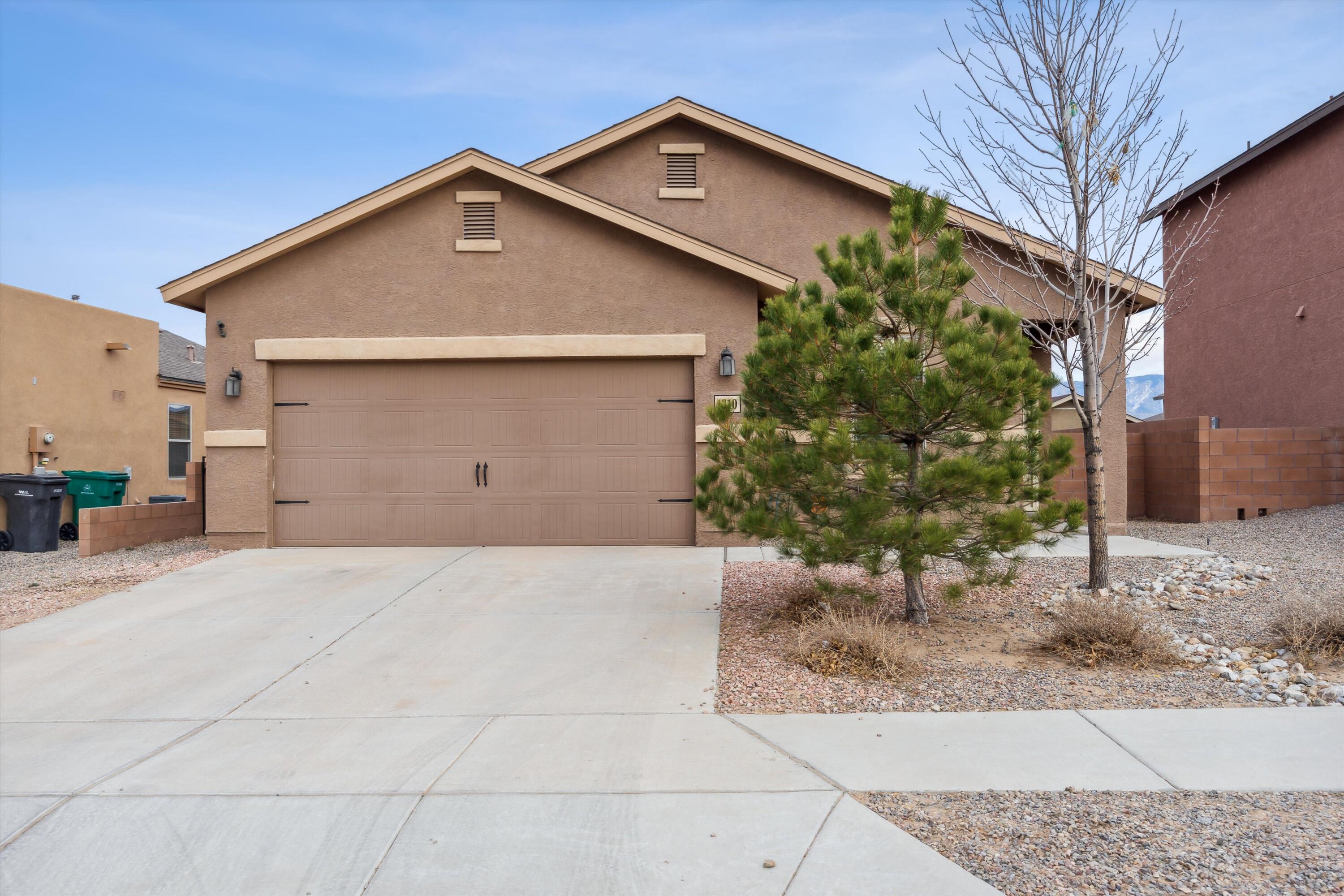 CLEAN AND COZY home in the High Range Subdivision of Rio Rancho! This charming home features 3 beds/2 baths, making it the perfect size! You'll love the tile flooring in the kitchen, which provides easy maintenance and a modern look. The bedrooms are comfortably carpeted, providing a cozy and inviting atmosphere. Walled-in backyard is the perfect place to unwind and relax, with a covered porch sitting area ideal for enjoying a cup of coffee or entertaining guests. The southwest xeriscape surrounding the home is both beautiful and low maintenance, making it easy to enjoy the natural beauty of the area without constant upkeep. A wealth of nearby amenities, including shopping, dining, nearby parks and trails provide a perfect backdrop for outdoor activities and recreation. Schedule a showing!