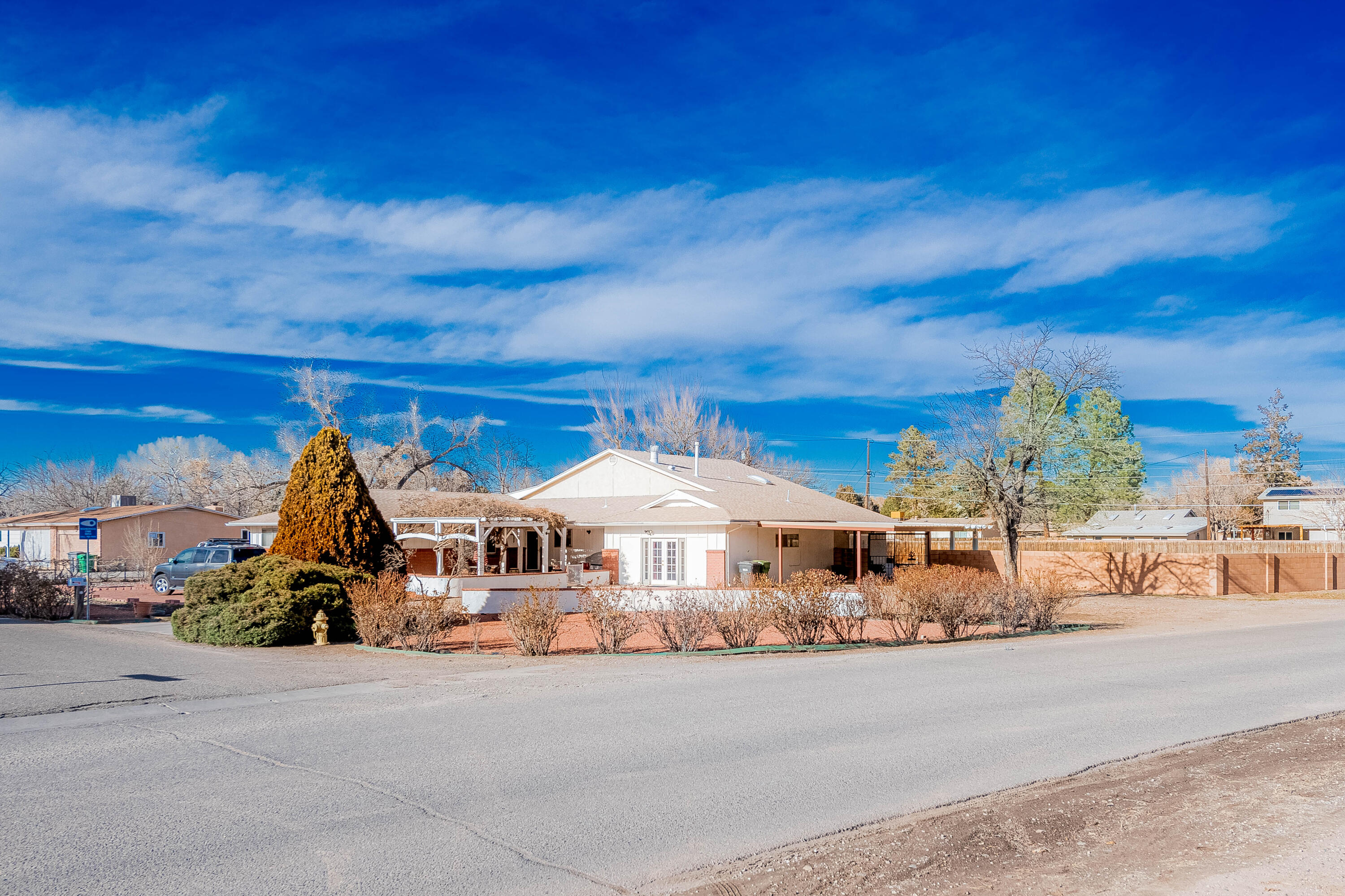 50K Price Reduction!! Come take a look at this highly sought out Western Meadows Subdivision home in far North Valley. Homes in this area have shared Bridal Trail in back of lot to access Bosque trails for horse back riding, hiking, and biking. In a private and quiet neighborhood with circular drive way. House has 5 bedrooms 3 bathrooms with a large living room on a large corner lot .62 acres with back yard access and 3 private wells on property and a two year roof. Make this your home today!
