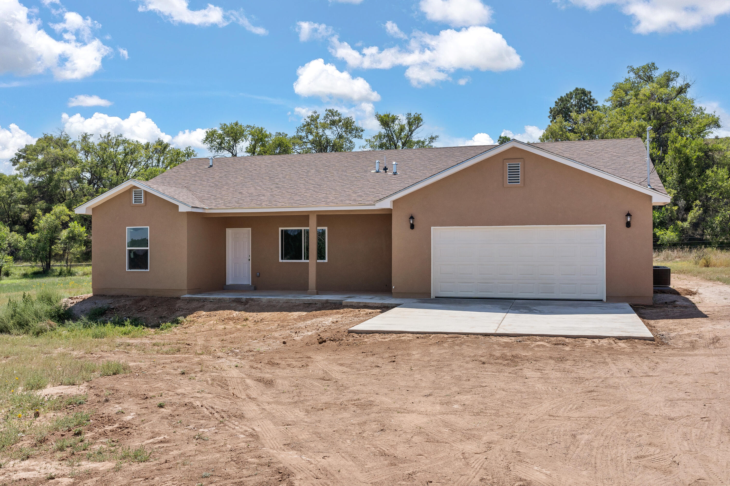 Builder occupied. $15,000 under appraised value! 2-acre horse property fenced and ready for your horses! Rare opportunity to own a new home without an HOA! Bring your horses! Here is a chance to pick up a brand-new home just minutes from Albuquerque at an affordable price!
