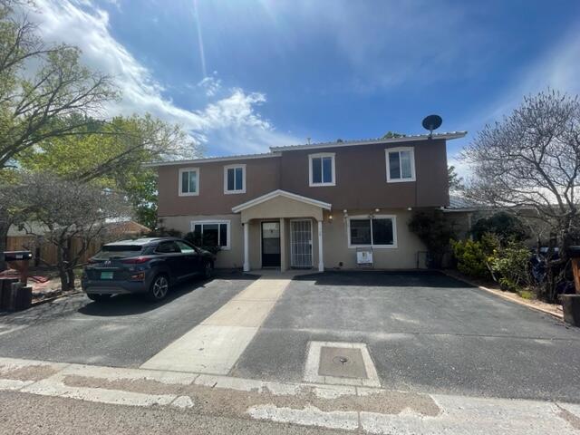 Comfy, cozy - 3 bedrooms, 1.5  bath townhome nestled in the North Valley.  The  lower level consists of a living room, washer/dryer/half bath and kitchen with the bedrooms & full bath upstairs.  2 parking spaces included. The kitchen has ample storage and counter space.  Living and kitchen floors are painted concrete for easy clean up. Townhome is in move-in condition with Central A/C and all  appliances in place + nice views of the park from upstairs bedrooms. Expand your indoor living outside - features a covered concrete patio & a yard for an easily managed garden. The backyard is fully fenced and has gated access to a grassy park for some added greenery & best of all, you don't have to maintain the grass!  Additional storage outside next to the patio.
