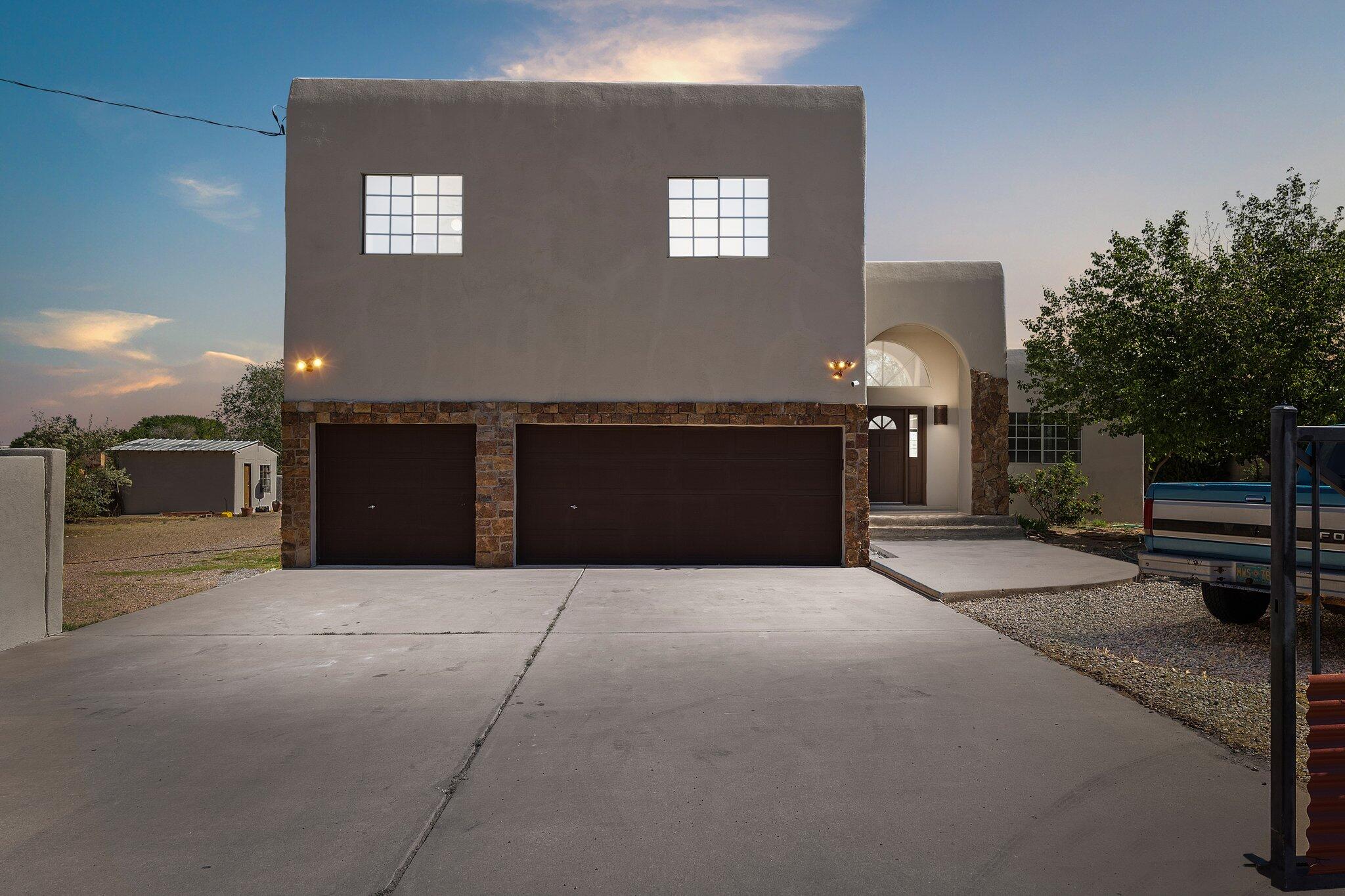 Excellent North Valley home located on a large .58 acre property! Home features 3,105sf with 5 bedrooms, 2.5 bathrooms, 2 living areas and a 3 car garage. Great front living area with saltilo tile that gives a Southwest feel. Large kitchen with ample cabinet and countertop space, gas range, microwave, dishwasher, high bar with seating space and a breakfast nook. Main living area and formal dining space. 1st floor guest room also makes a great home office. Upstairs find the spacious owners suite with a private balcony and bath. Balcony offers the perfect unobstructed mountain views! Bath with dual sinks, garden tub, shower and huge closet. 4 additional guest rooms! Backyard access with a covered patio and storage shed!