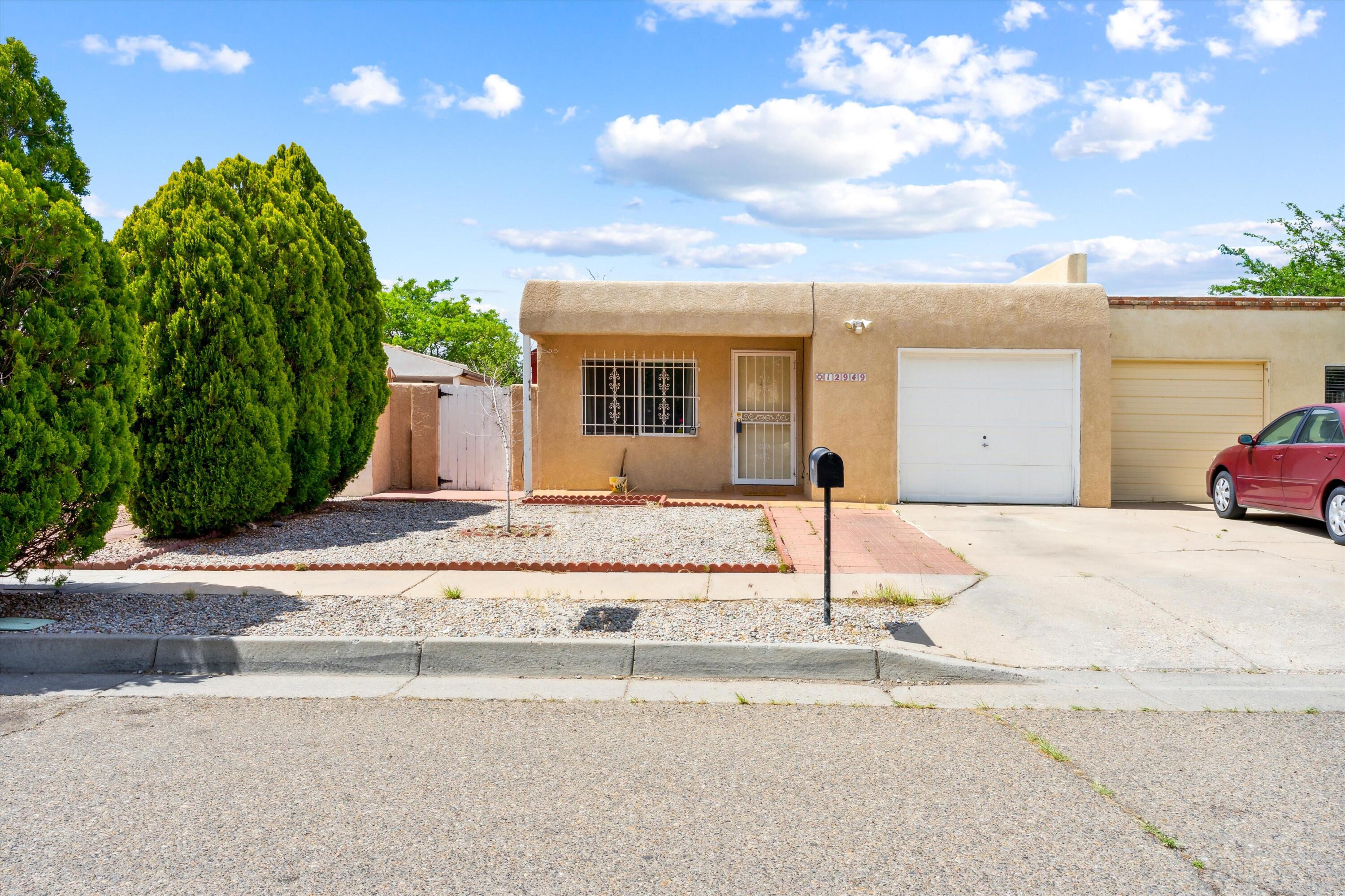 Don't miss this beautiful 3 bedroom, 2 bathroom home in SE ABQ! The home features a spacious living area, functional kitchen and a backyard with a patio and plenty of space for entertaining. Bonus room that would make a great spare bedroom or home office. Schedule your tour today!
