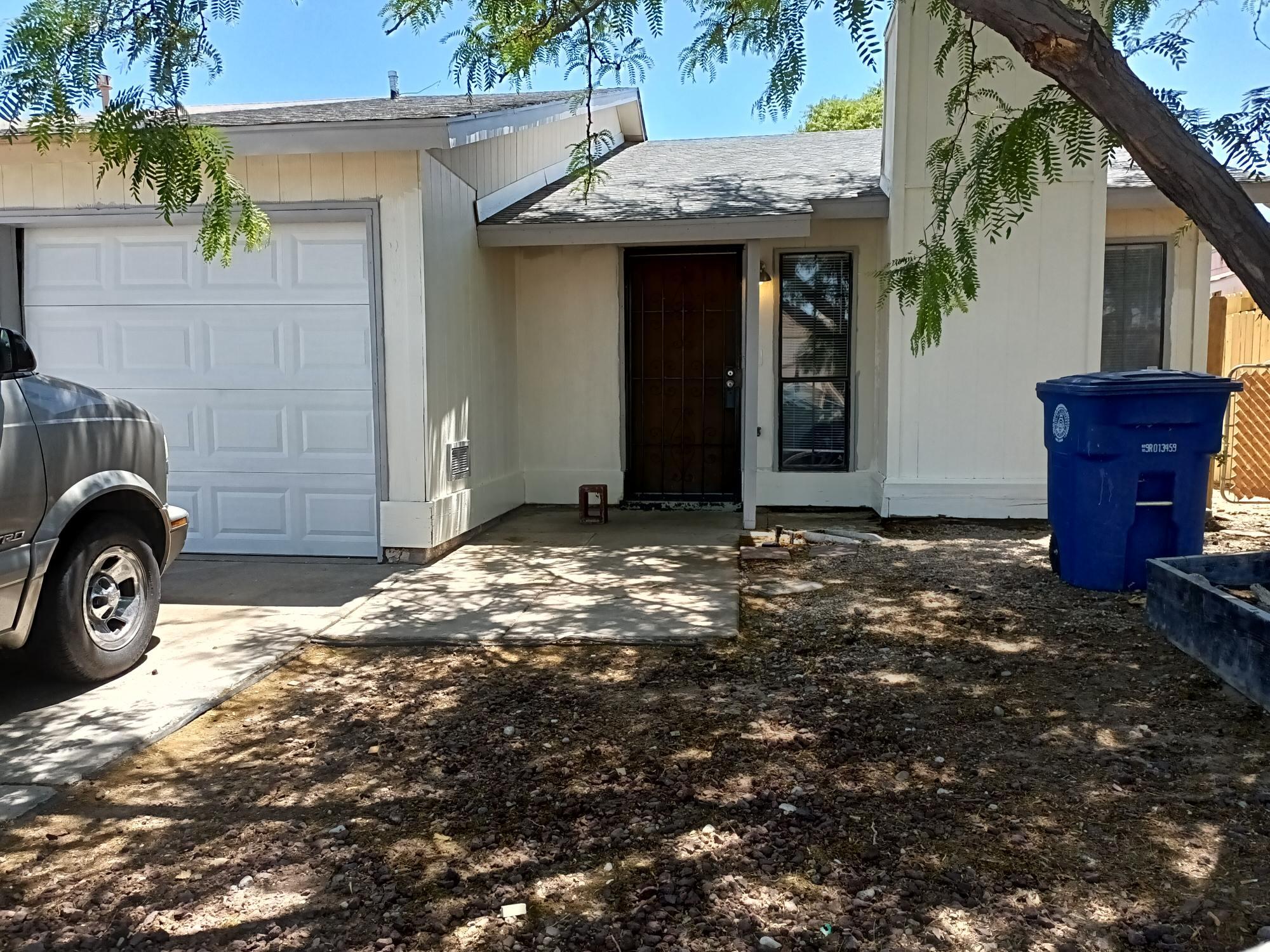 Nicely updated townhome. A must see. This one won't last long. 3 bed 2 bath with a woodburning fireplace. New countertops, Newer Swamp Cooler, Roof, Heater. New flooring in kitchen and bathrooms.