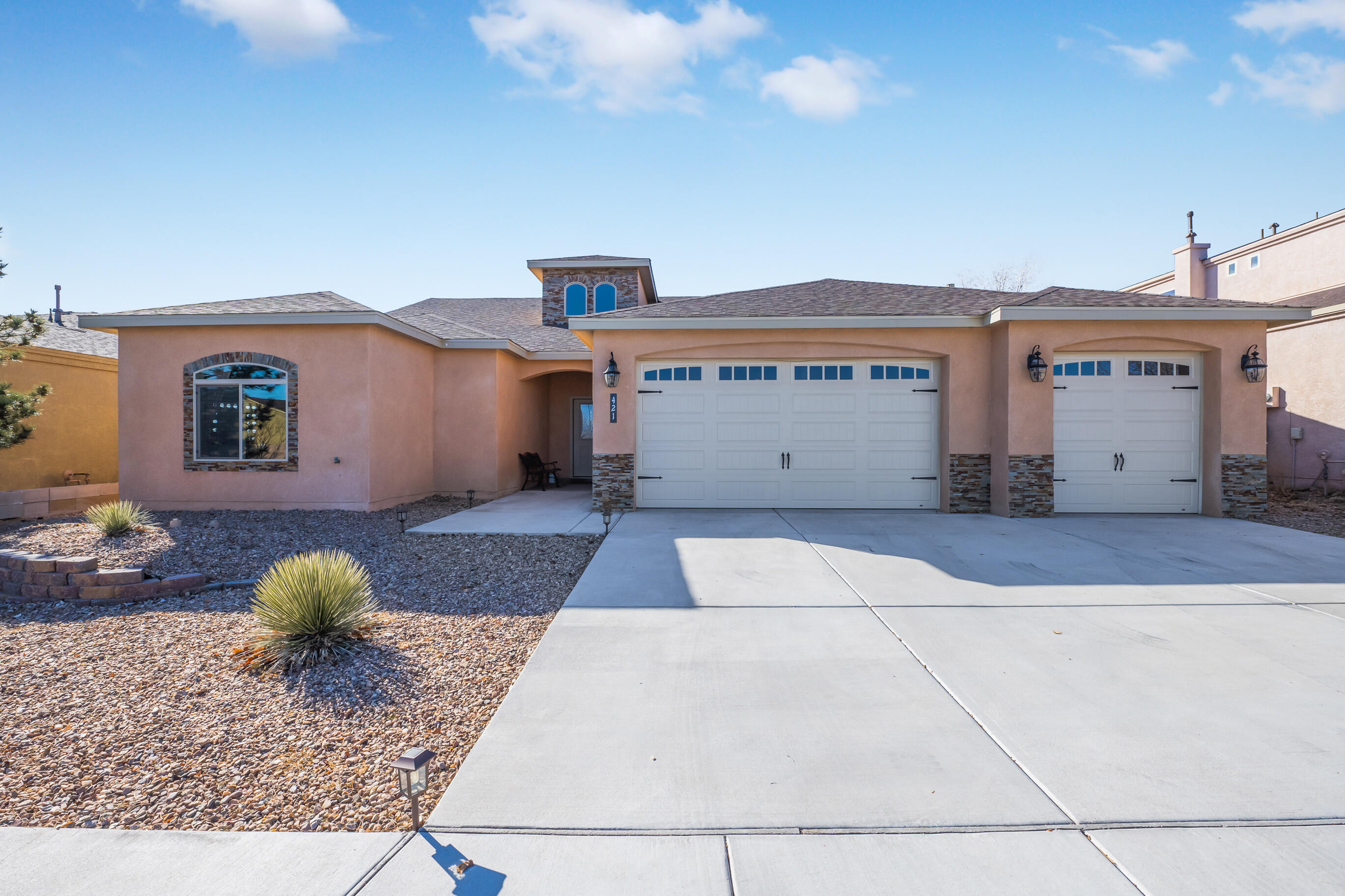 Stunningly beautiful home in Los Lunas is ready to please its new owner! The high ceilings and open floor concept in the living room and kitchen are warm and inviting. You'll enjoy cooking for your family and friends in the nicely laid out kitchen with island and bar areas. The large master bedroom has an amazing bathroom with his and hers vanities and the HUGE walk-in closet will certainly ease the need for storage. If storage is still a concern, the third garage will allow you to store your vintage car or use it to store those important memories. If that was not enough, the home is conveniently located near supermarkets, hardware stores, restaurants, parks, entertainment and other amenities. I-25 highway access is just minutes away and will make that drive into ABQ much shorter.