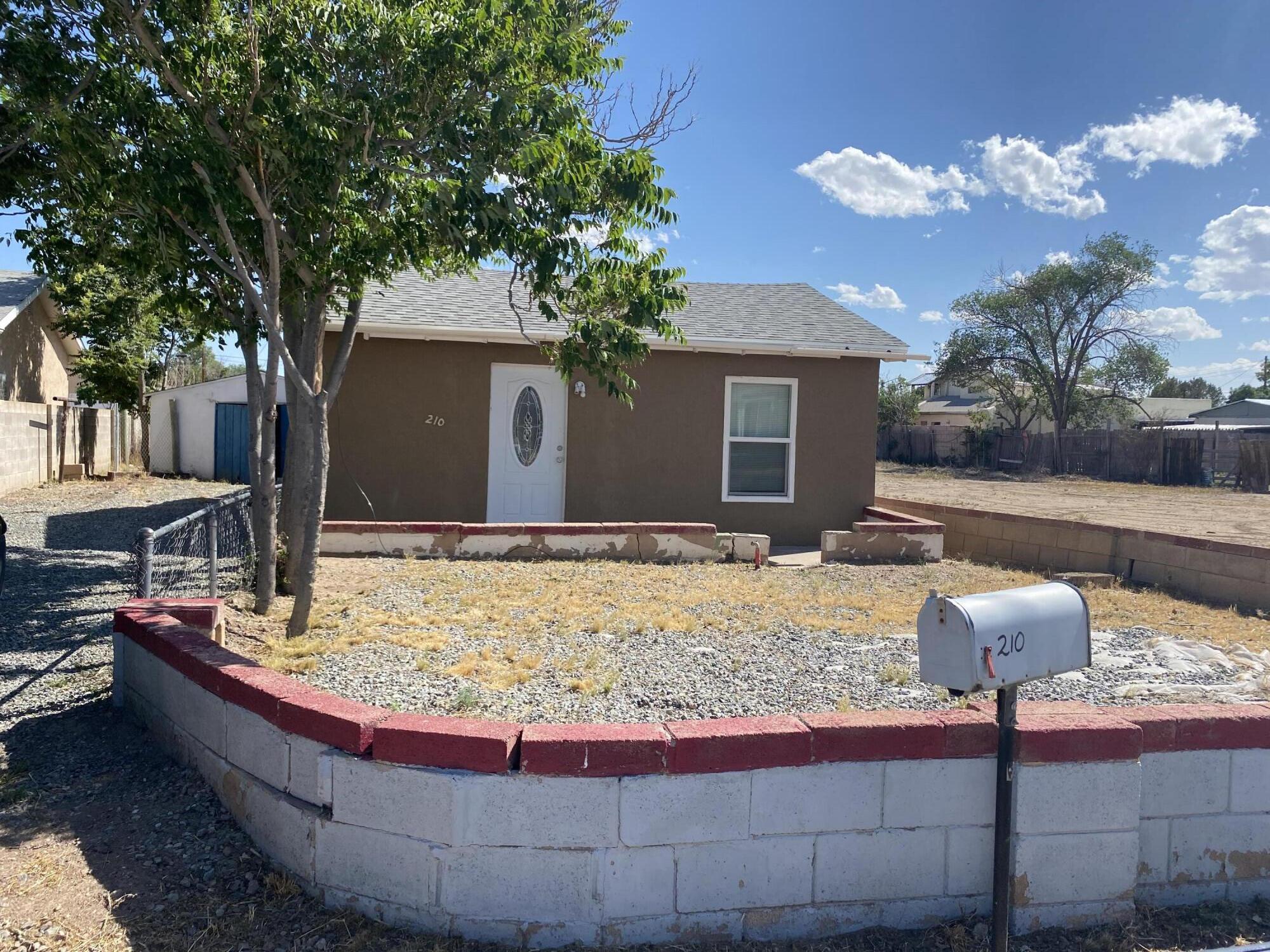 This home features a new roof (less than 2 months old), new sewer line from property to the street, updated windows and tile floors. Rental income between $1100 and $1200 a month.  Get creative with the land in the back of the property. Property sold as is. Come take a look.