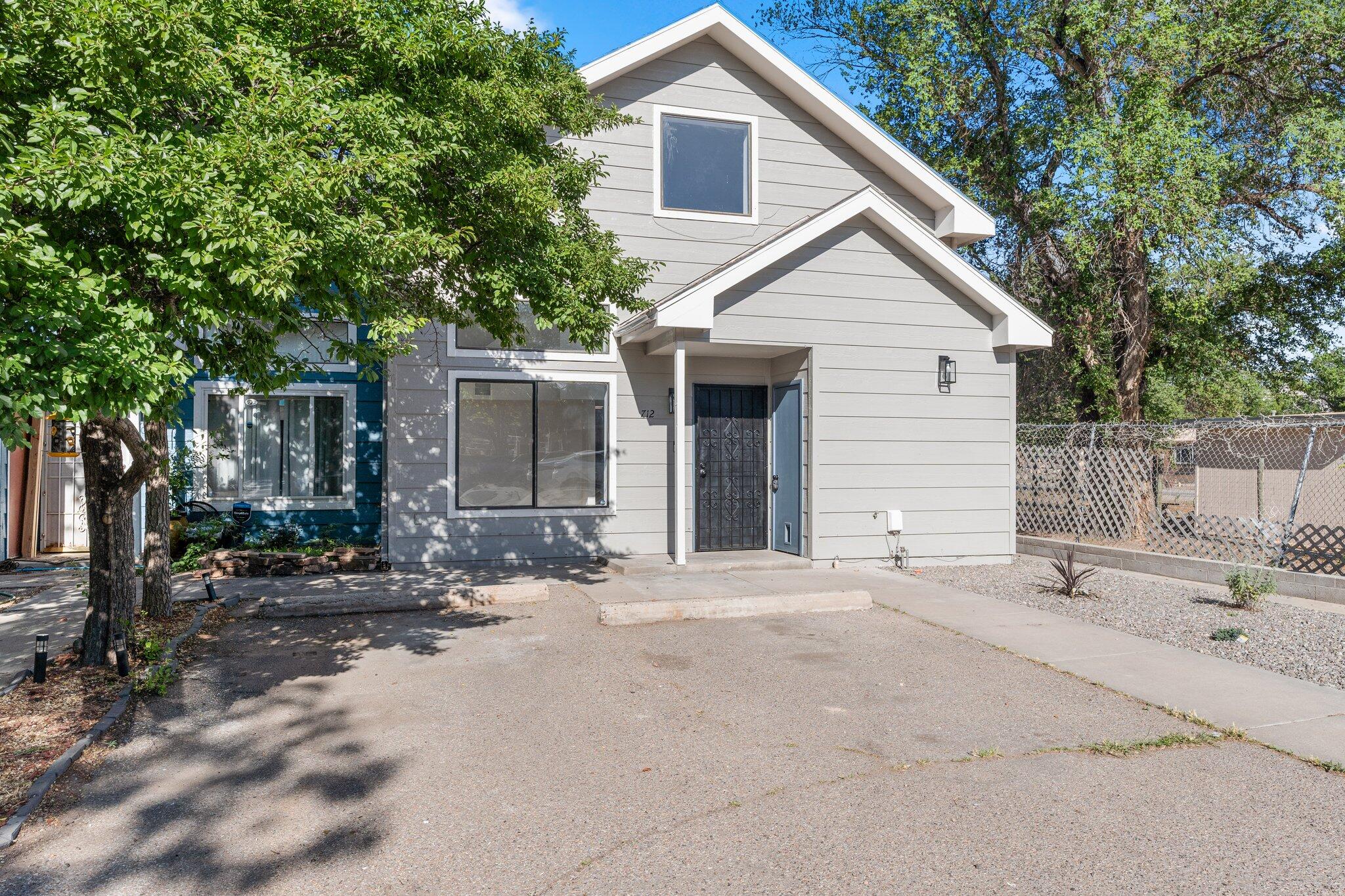 Incredible find in the downtown/Barelas area! This beautiful townhome is located conveniently close to downtown Albuquerque, Tingley Beach, the Bosque, the Zoo, Abq BioPark - Botanical Gardens, Abq Rail Yards, Rio Grande Park, and a Bike/Walking trail. The property includes new flooring, new carpet, new granite countertops, new a/c unit, new appliances, new cabinets, new interior/exterior paint, new light fixtures, new drip system, and a xeriscape front yard. Don't miss the opportunity to make this wonderful property your new home.