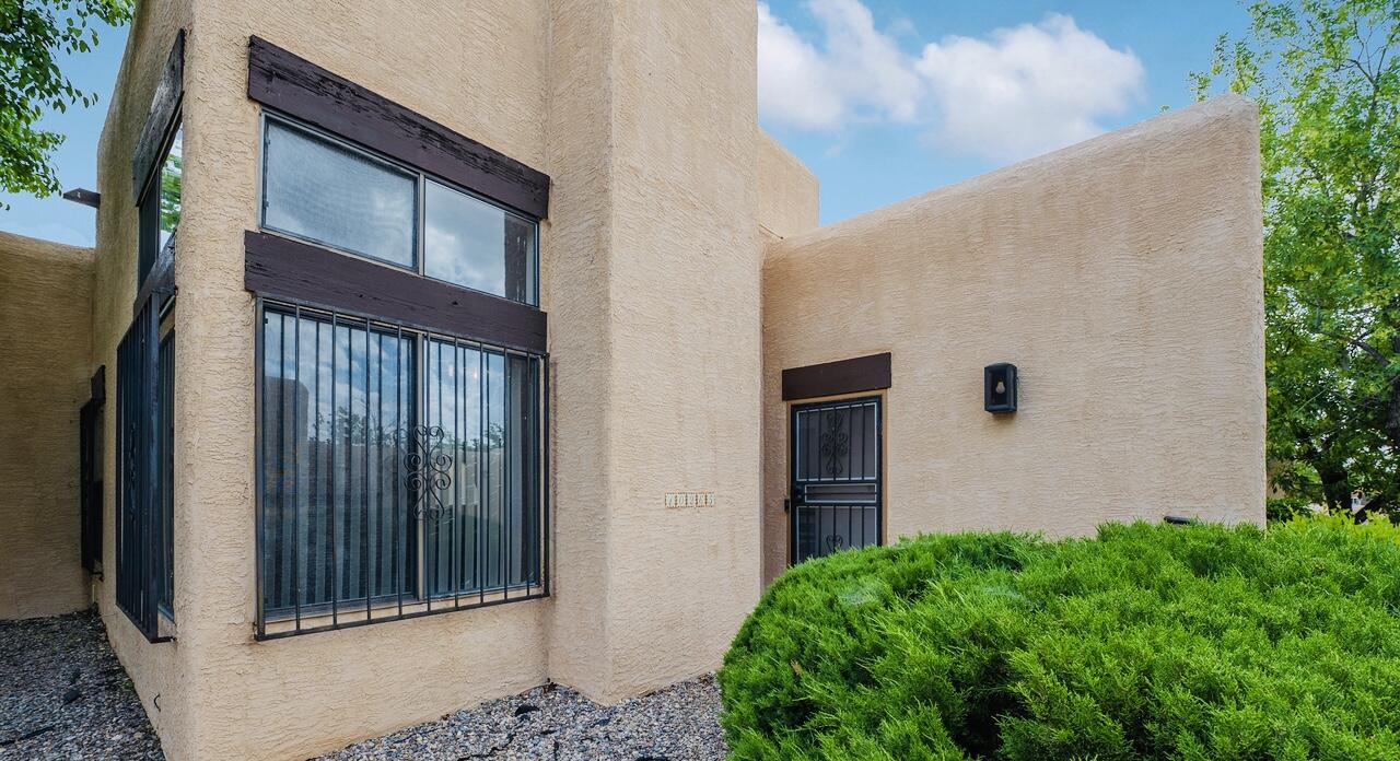 Welcome to the desirable El Paseo Townhome Community, nestled between Tanoan Country Club and Academy Hills Park. This stunning 2 bedroom, 1.75 bathroom townhome boasts a 1-car detached garage and a spacious, private back patio perfect for entertaining guests or enjoying a peaceful evening. The updated kitchen and bathrooms feature modern finishes and appliances, while the newer water heater and master cool A/C ensure comfort and convenience year-round. The bonus den/office space off the dining area provides ample room for work or relaxation. Take advantage of the community's swimming pool and clubhouse, perfect for summertime fun. Don't miss out on the opportunity to make this beautiful townhome your own. Schedule a showing today!