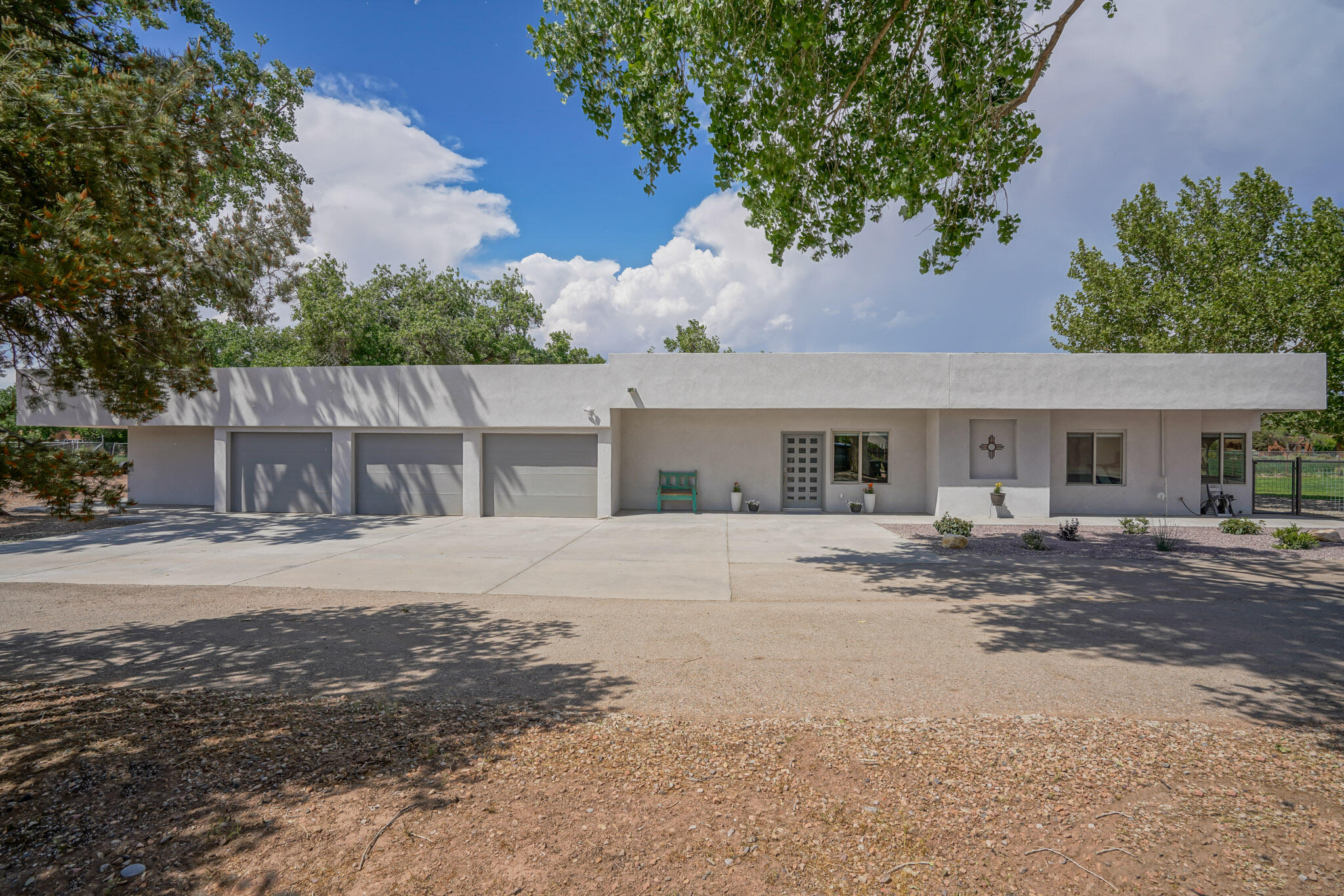 Updated multi-generational property on a private 1 acre lot in the far North Valley. This home is a total of ~ 4500 sq ft with 7 bedrooms, 5 bathrooms, and 3 car garage. The attached in-law suite (~1000 sq ft) has its own separate entrance, a full kitchen, dining area, living area, washer/dryer hookups, 2 bedrooms, and 1 bathroom (Airbnb?!). The main house has 5 bedrooms, 4 bathrooms, open concept living area, oversized laundry room and pantry, and sliding doors to the landscaped backyard (with an irrigation well). The property is situated down a secluded road and apart from other homes. It offers gorgeous mountain views, backs to a lush alfalfa field, has a large fully fenced grass field, w/privacy, and room for your toys, campers, and trailers! Close to trails/restaurants/freeway