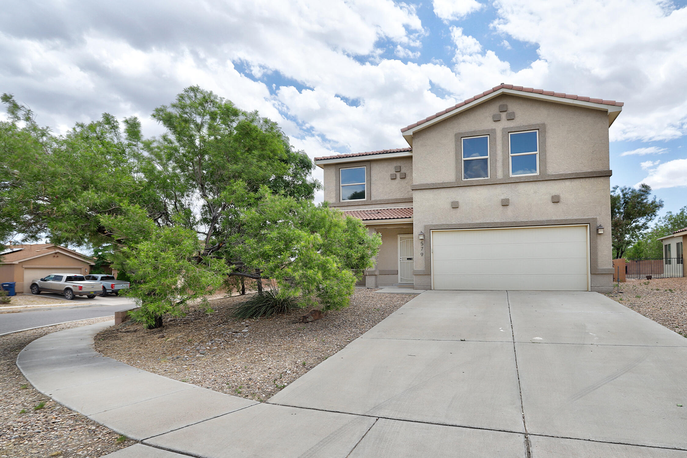COME SEE this BEAUTIFULLY REMODELED two story home in the CHARMING HUNING RANCH COMMUNITY!! Interior complete with DESIGNER SELECTED TWO TONE paint, PLUSH New Carpet, GORGEOUS Laminate flooring and a DAZZLING Lighting Package!! OPEN CONCEPT Kitchen features a LARGE ISLAND and Stainless Steel Appliances!! Primary suite features a spacious room, his and her vanity with a garden soaking tub!! Conveniently located near several schools, parks, and shopping centers, all with easy access to I25!! Easy commute to Albuquerque!!  Don't Miss out on your chance to own this true Gem!! COME SEE IT TODAY