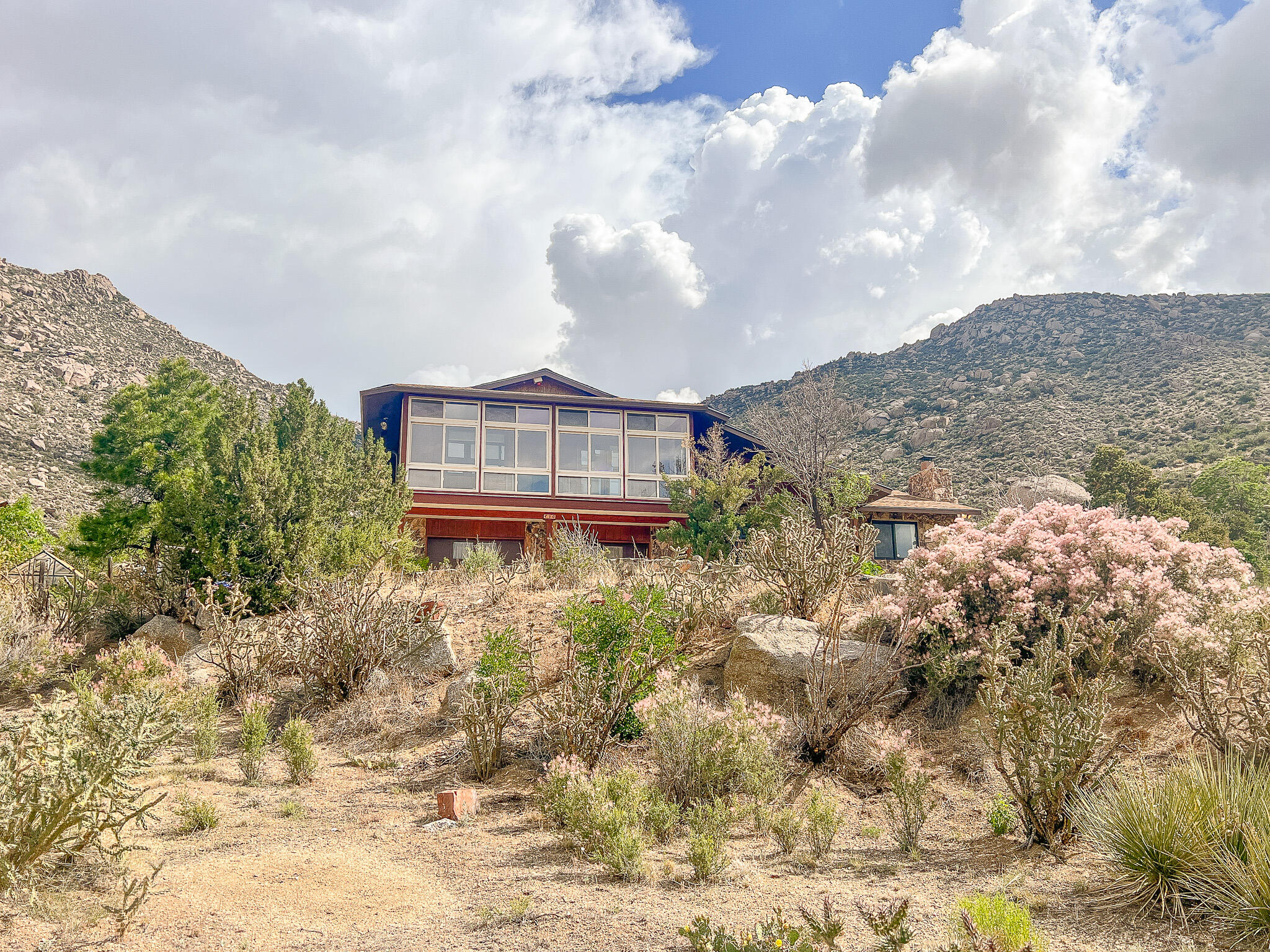 Beautiful views from this home located on a .87 acre home site.1 owner Ranch Style with original plans  3 bedrooms, 2.5 bath home  with a 2-car attached garage (half bath in lower level). Additional features include a lower level skylight sunroom w/ fish pond & live plants , upper level vinyl windows w/ screens sunroom for neighborhood viewing, and an additional large 2-car detached RV garage with workshop space. Refrigerated air 2022. Septic well maintained. Private well over 600 ft depth! City water/sewer available for future connection if desired at a fee that needs to verified! Additional land adjacent to the property may be purchased from neighbor but terms have not been clarified yet but they are open to a proposal if there is interest!  Offer Now!!!