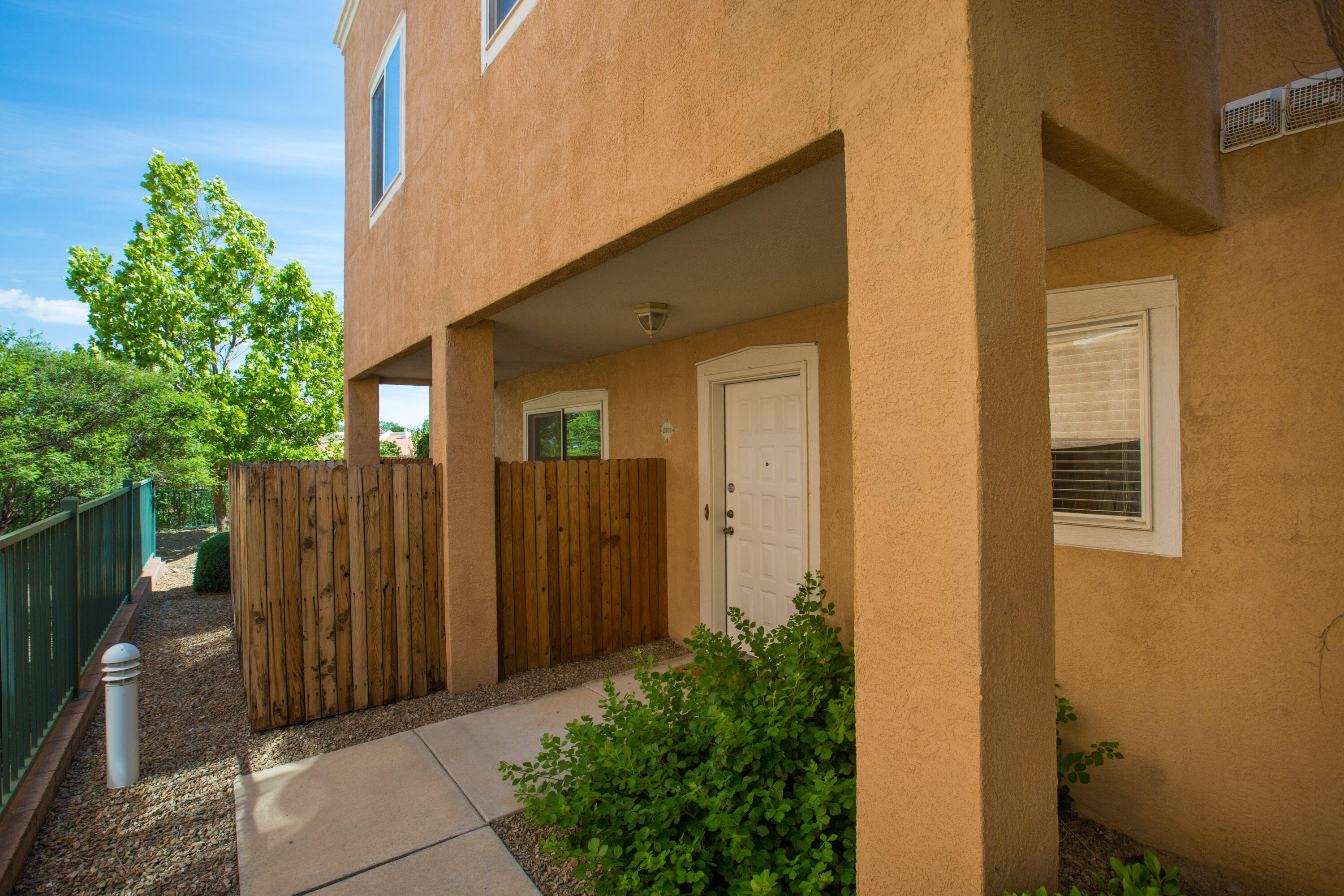 Well maintained condo in a great location! Nestled in the quiet Oso Park gated community, An open concept floor plan with a great room with a cozy fireplace make this one warm and inviting.  No carpet on the lower level living area. The dining nook and the galley kitchen are well designed. The kitchen offers tons of workspace and great storage. The main level also features a dedicated laundry room & guest powder room.  On the second level are the bedrooms. Primary bedroom complete with  ensuite. Two additional bedrooms and full bath along with a utility closet complete the upper level. Enjoy the private patio with easy access and an attached  garage. This condo offers ultimate convenience. Close to banking, shopping dining, parks and biking and hiking trails too!