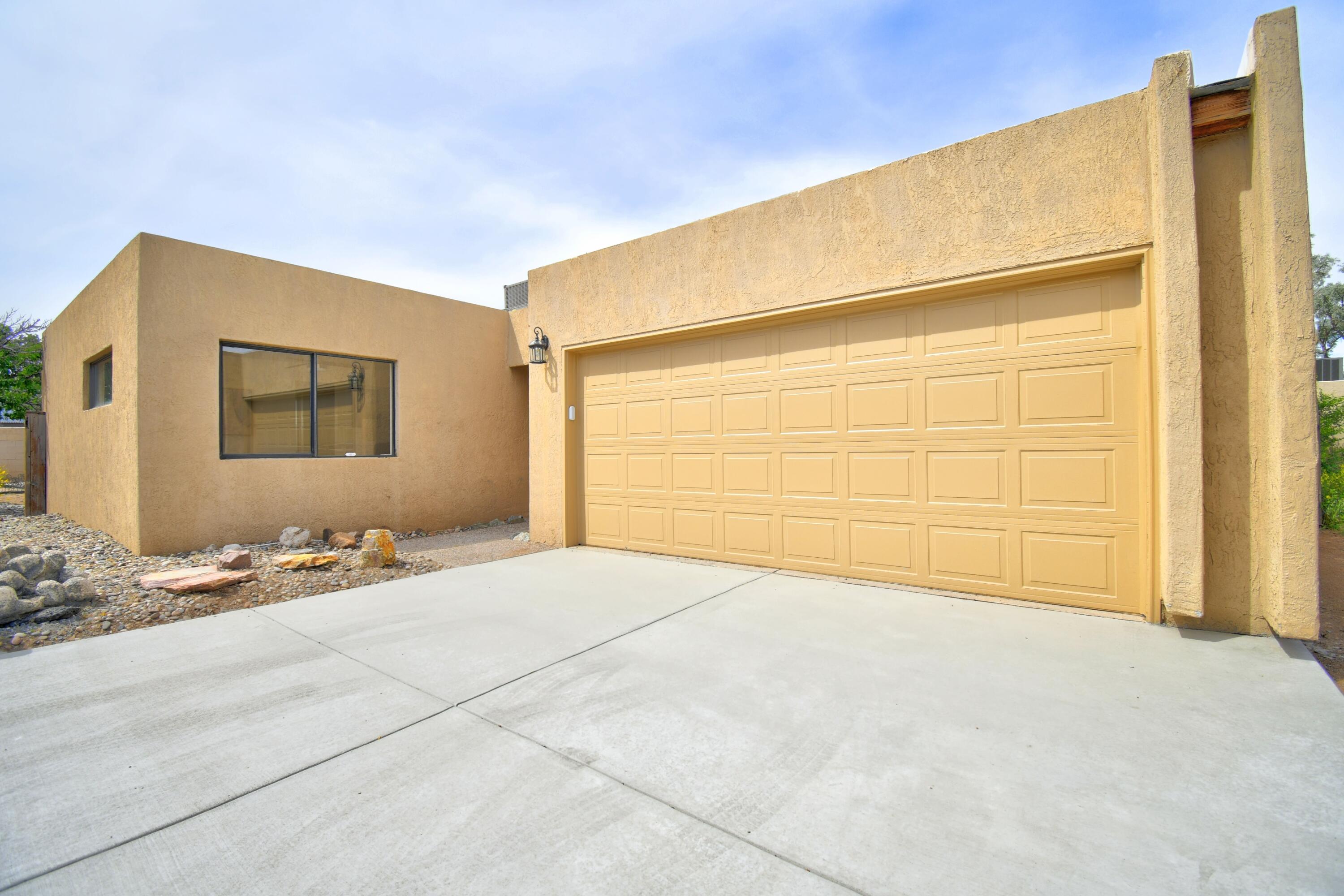 This charming townhouse offers a comfortable and modern living experience in a scenic location. With 2 bedrooms and 2 bathrooms, this home has been thoughtfully updated to meet your needs and desires. There are two spacious bedrooms, providing ample space for rest and relaxation. The kitchen has been tastefully updated and features stainless steel appliances, adding a sleek and contemporary touch to your culinary space. Prepare meals with ease and style. Abundant natural lighting fills this townhouse, creating a warm and inviting atmosphere throughout. One of the highlights of this property is the peek-a-boo view of the stunning Sandia Mountains. Imagine enjoying your morning coffee or evening sunset with this  picturesque backdrop.
