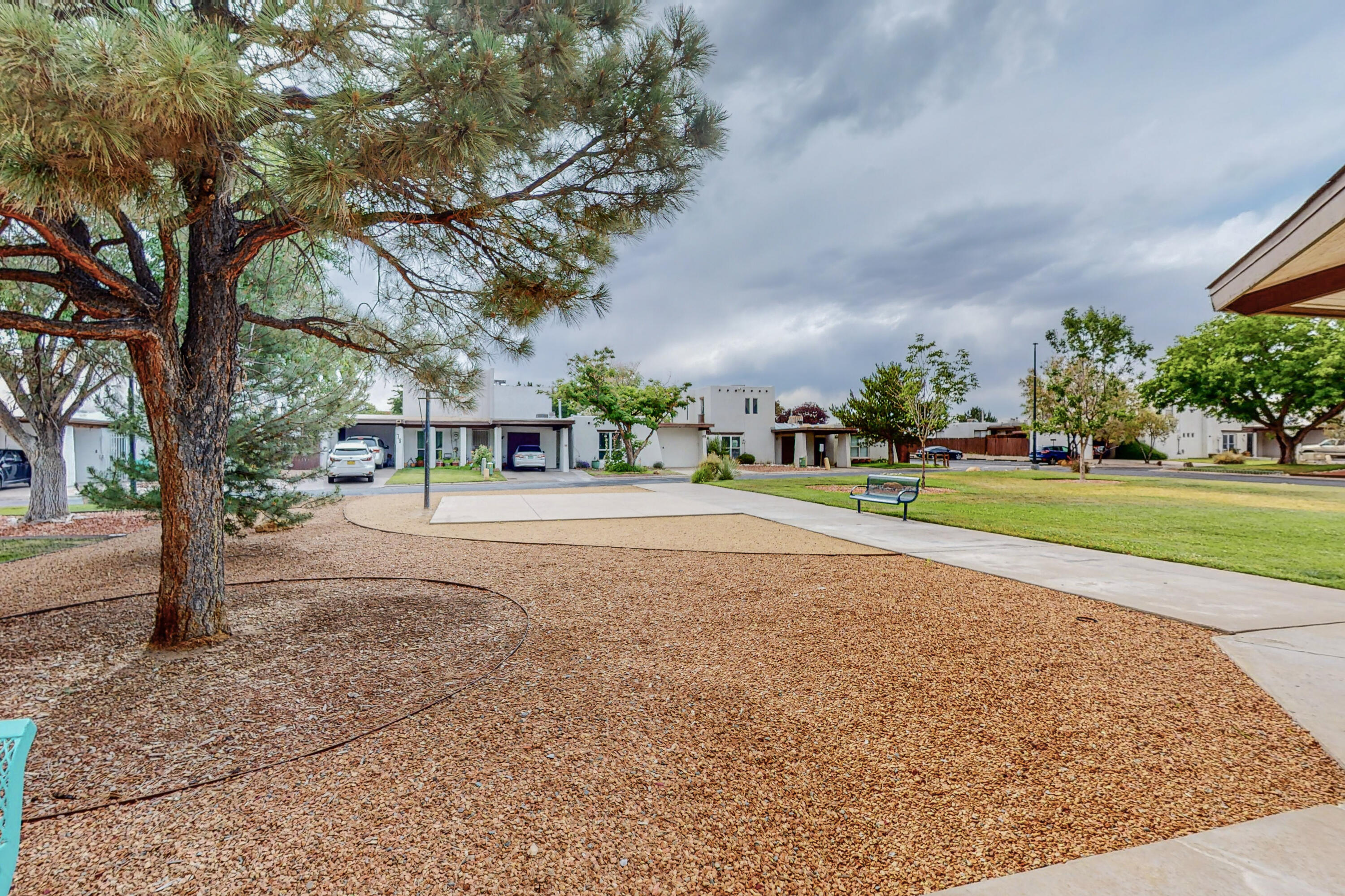 Lovely home in private Villa de Paz community with access to restaurants, shopping, and travel.  This 2 story townhome features a private courtyard with large shed, 3 BR, 2 BA, and driveway parking.  This home does need a little TLC and is priced accordingly. Do not miss out on this home at this price!