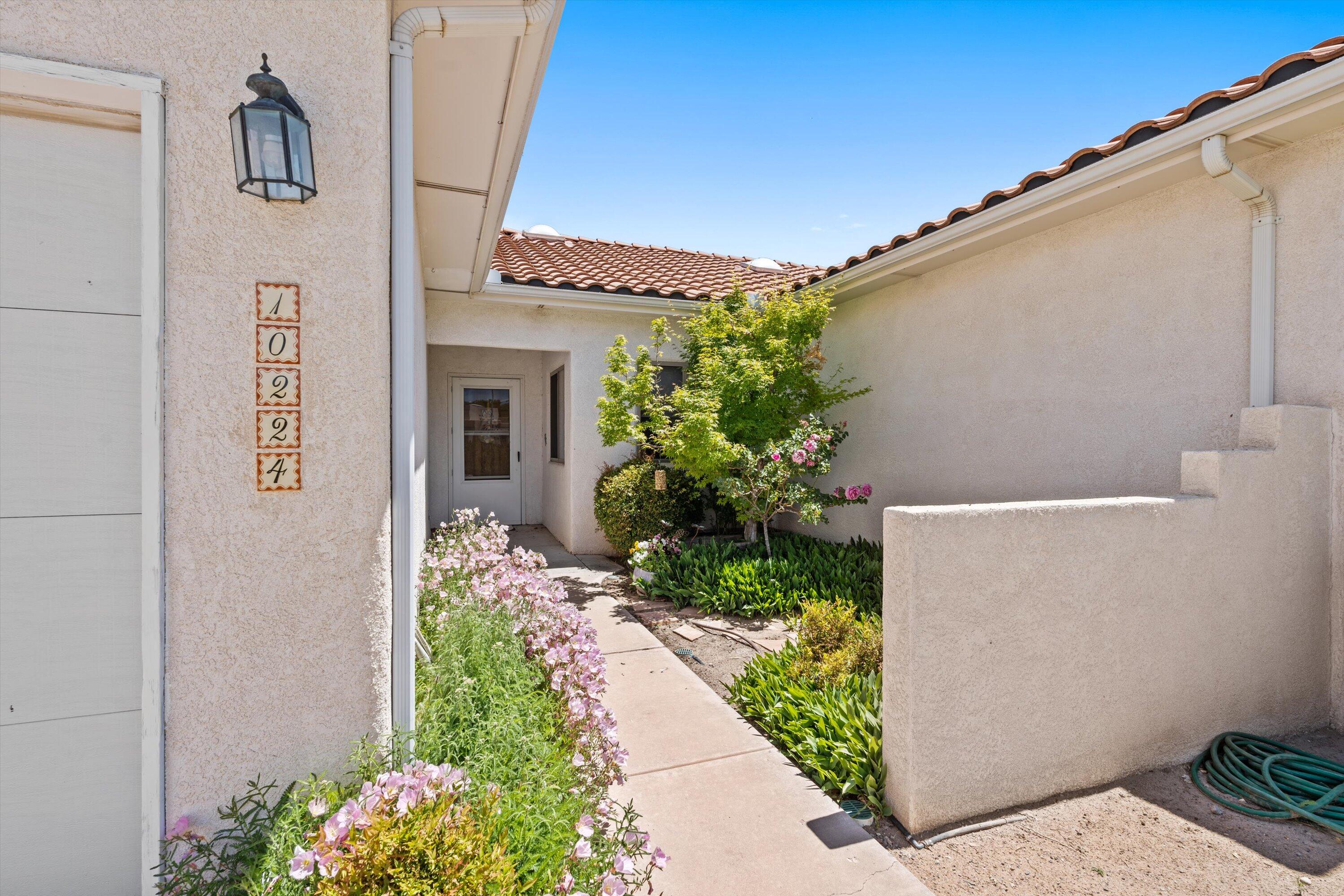 With a spacious open floor plan, high ceilings, and abundant natural light, it creates an inviting atmosphere.Prepare your favorite meals with ease in the spacious kitchen featuring ample storage space, and entertain guests effortlessly in the adjacent dining area, boasting lots of natural light and views!Step outside into the beautifully landscaped backyard, a private oasis designed for relaxation and entertainment. An office space/hobby room greets you to the right upon entry.Conveniently located near amenities and major highways. Don't miss this extraordinary home Schedule your private tour today!