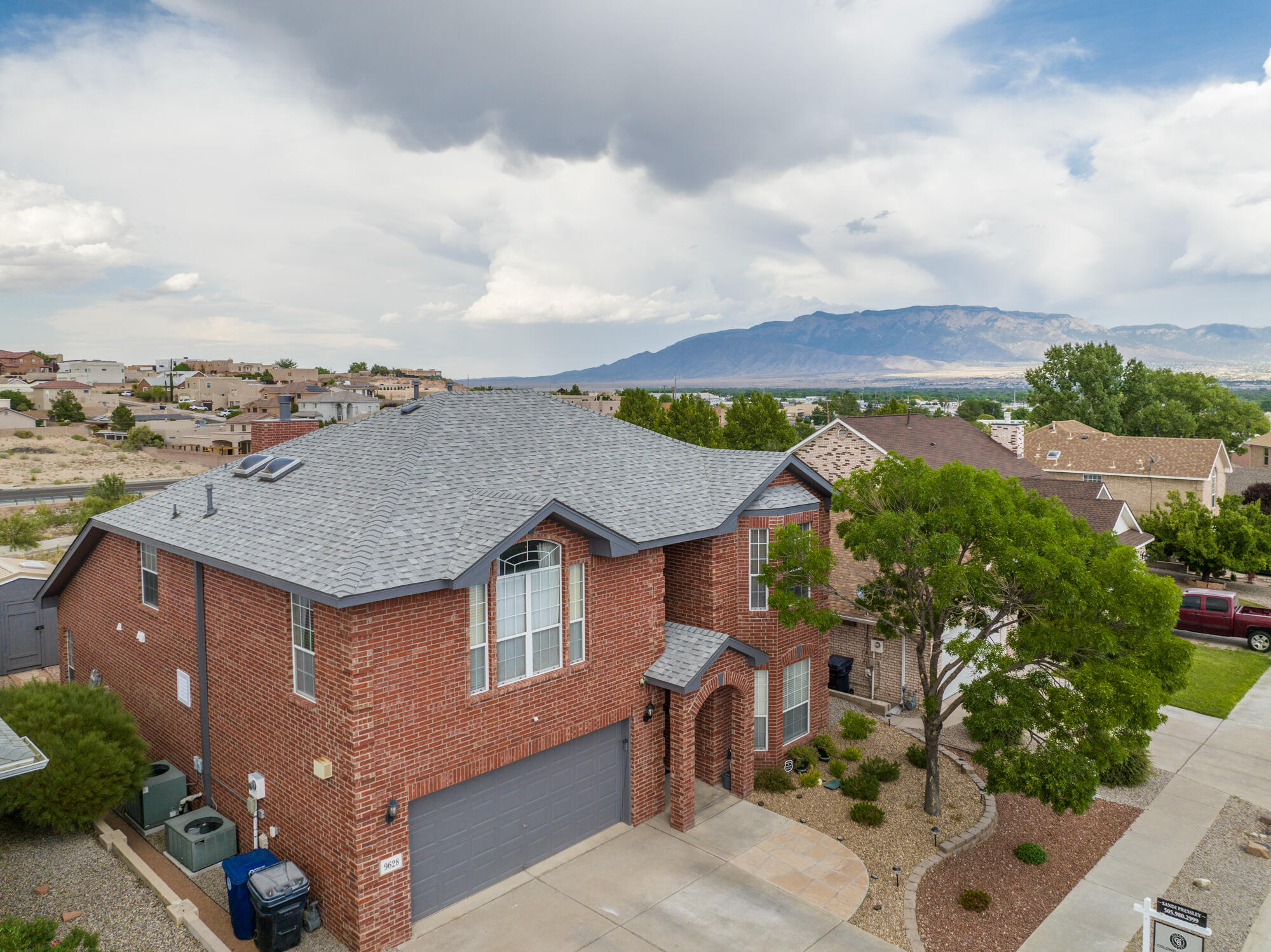 Stunning remodel!  Great location! Mtn Views!  Style & beauty abound in this 4BDR/3BA Oppel Jenkins home! New Roof! (2022) New Water Heater! (2023) Updated Baths! REFRIG AIR!  Light, bright & open living room has soaring ceilings, gas fireplace & tile flooring!  Loft!  Beautifully updated kitchen recessed lighting, granite countertops, painted cabs, soft close doors, island with walnut top, coffee bar, pantry, bkfst nook & bar!  Primary suite bath remodel w/hydro massage tub, sep shower, tile flooring, soft close cabs & drawers, granite counter w/double sinks. Incredible outdoor living space w/mtn views, extended covered patio, patio cover w/roll shades, perimeter lighting & easy care rock landscape, shed w/metal roof! Finished, insulated garage with wkshop area!