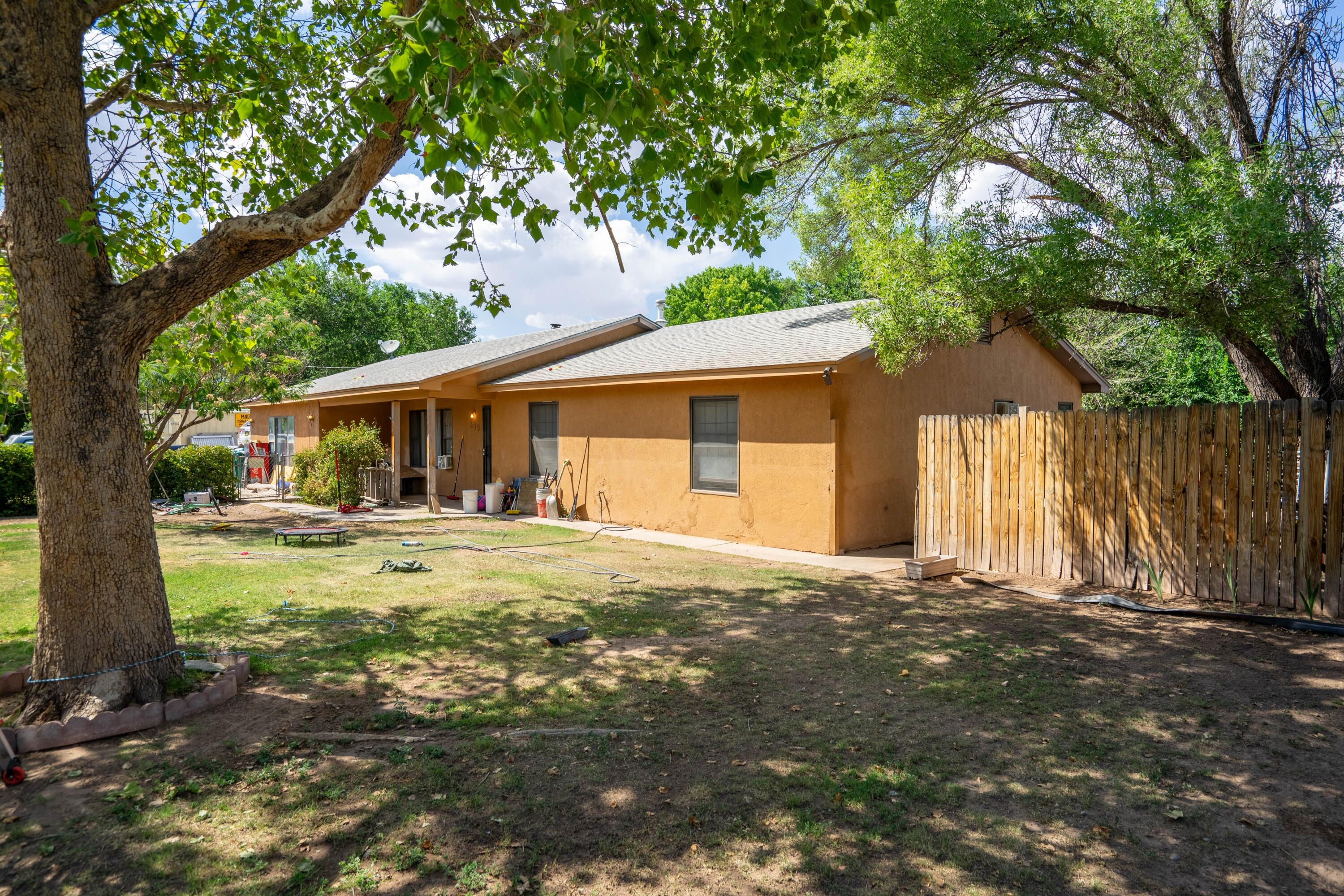 This home is a perfect fit for any who desire a North Valley home on a sizable plot of land! The possibility for upgrades also makes this home an investors dream. Located on an extra spacious lot, this dwelling provides and homey and cozy experience to anyone interested in North Valley living, and even includes 2 living areas! Near beautiful walking trails, and plenty of community favorite restaurants and activities, this is a rare opportunity to own a very well cared for home, on a timeless parcel of Albuquerque Valley land!(The home is currently in the process of being professionally cleaned)