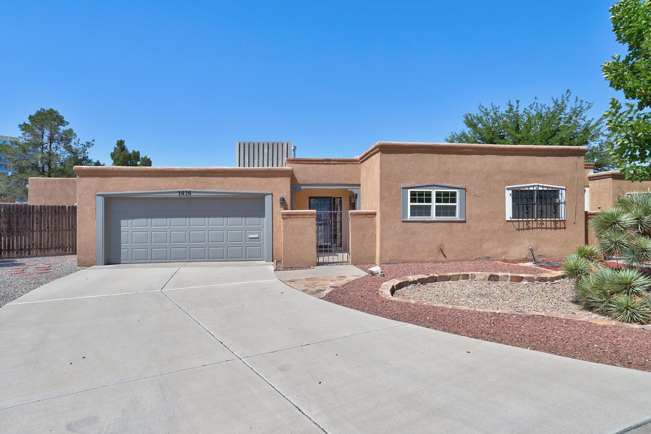 Lovely Single Level Townhome in the Sought After Country Club Neighborhood*Updated Kitchen with Stainless Steel Appliances*Open Flow From Kitchen to Dining & Living Areas*Beamed Ceilings*2 Fireplaces*Master Suite has Backyard Access, Kiva Fireplace and 2 Closets*Refrigerated Air*Fenced Backyard with Low Maintenance Landscaping*Call Your Agent to Schedule a Showing Today*