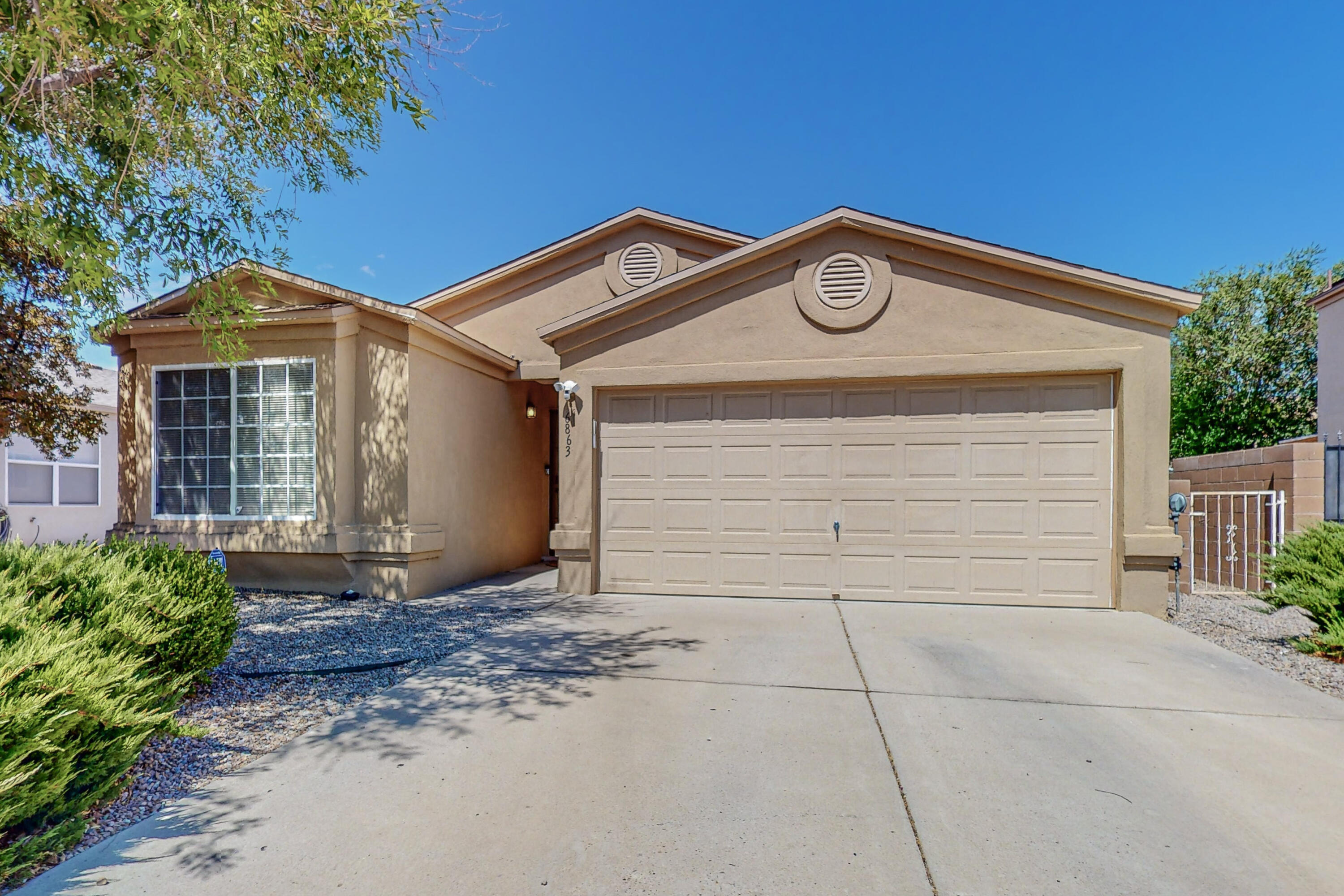 Introducing the Perfect Ranch Home in the Heart of Ventana Ranch!This stunning home offers an open floor plan, making it ideal for entertaining guests. With its abundance of natural light, the interior feels bright and inviting. The kitchen features a convenient breakfast bar, perfect for enjoying your morning coffee or hosting casual meals.The flooring throughout the house consists of high-quality materials, including laminate wood and tile. This combination not only adds a touch of elegance but also ensures easy maintenance and durability. The layout of the home is thoughtfully designed, featuring three bedrooms plus an office space, providing ample room for your family's needs.For those who love outdoor gatherings, you'll be delighted by