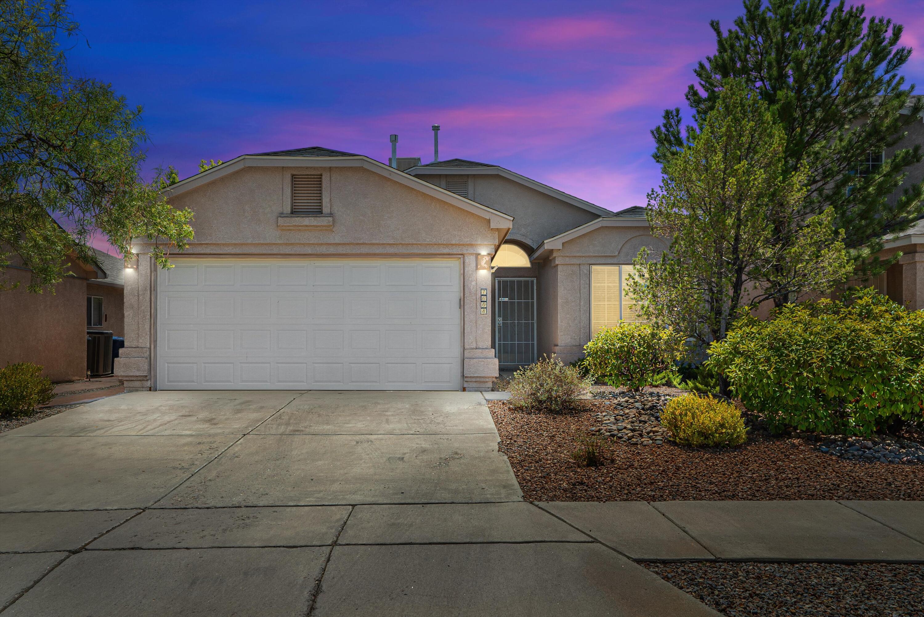 3BD/2BA IN A DESIRABLE HOA w/ COMMUNITY POOL! Lush front yard and expansive private backyard. Inside, feel the serene backdrop of a soft gray pallette paired with pecan laminate flooring, high ceilings and custom insets for art or books. Open kitchen/dining/living area with built-in fireplace as its centerpiece. Kitchen breakfast bar seating, granite countertops, and pantry round out your cooking area. Carpeted bedrooms and tiled wet areas make cleaning a breeze.  Roomy master with the essential walk-in closet. The private backyard is landscaped with a combo open patio and covered porch, a sprinkling of trees, and gardening boxes to cultivate your own veggies and spices. Near beautiful walking trails and parks and in a highly sought after school district!  This one is a keeper, call today
