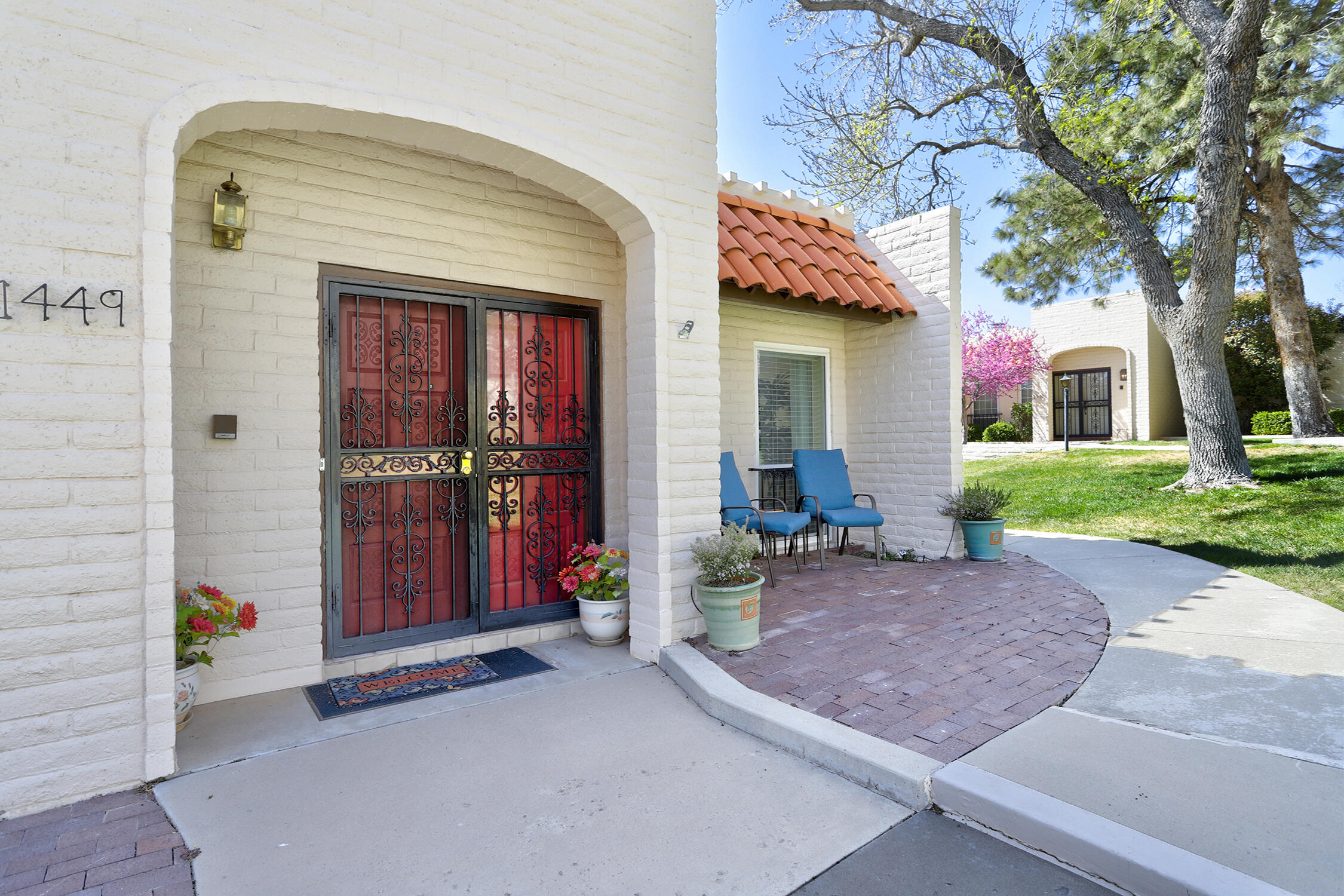 Beautifully Remodeled CUSTOM Single story, HOME in the Villa Serena community - A 2.75% Assumable VA Mortgage!  Light, bright & open floor plan w 2 living areas, formal dining + office with Kiva fireplace, Custom built-in desk, cabinets, bookcases, large closet with 6 large built-in cabinets internet ready or 3rd bedroom. Lots of updated features throughout - Floors, Lights, Kitchens, Baths, ++ Living room w kiva fireplace open to dining room. Kit w breakfast nook & pantry. Main bedroom suite w luxurious bath & walk-in closet. 2nd bed w double walk-in closets. Lots of Storage! Carefree Living w Clubhouse, Pool, Sauna, privacy.  In Four Hills with Country Club & Golf course!! Monthly dues cover water, trash, sewage, landscape upkeep, exterior painting, swimming pool & clubhouse.