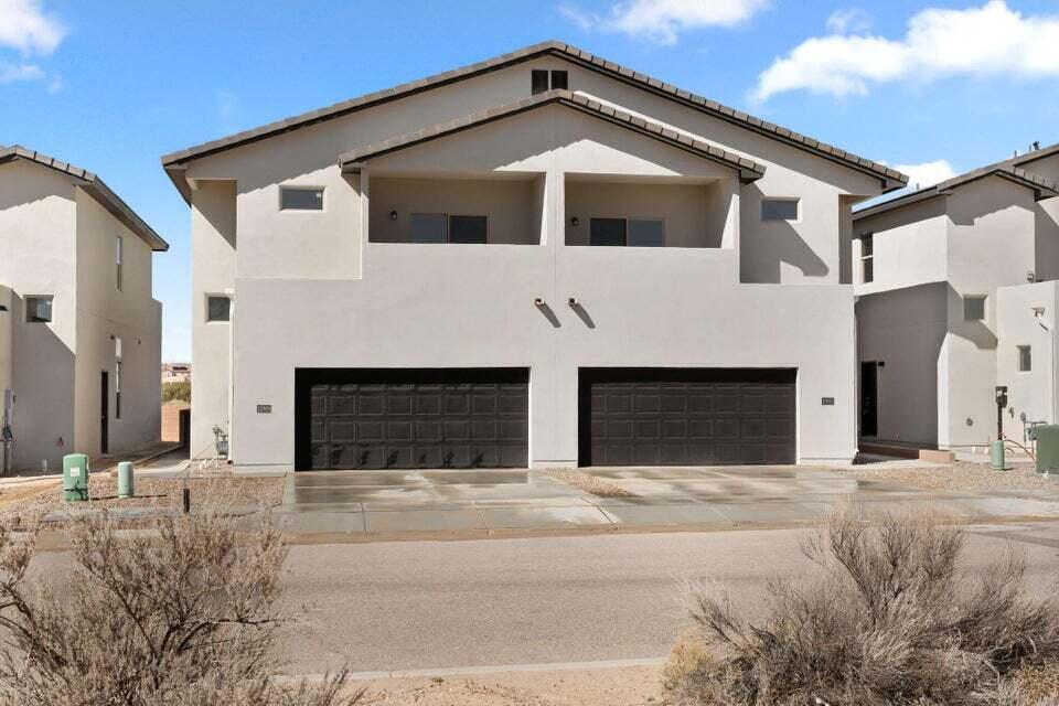 Owner Financing! Brand new upscale townhome by Prestige Custom Design located in the Heart of Rio Rancho! Home features 1,907sf with 4 bedrooms, 2 bathrooms, a loft and 2 car garage! Great open floor plan with beautiful wood floors. Spacious living area with recessed lighting. Kitchen with upgraded cabinetry, granite countertops, stainless steel range, microwave, dishwasher, refrigerator, pantry, island with seating space and a family dining area. Upstairs take advantage of the loft space perfect for a kids living area. Owners suite with a walk-in closet, balcony with stunning mountain views and a private bath. Bath hosts an over sized vanity with granite countertops and a walk-in shower with marble tile surround. Two additional guest rooms! Backyard with covered patio