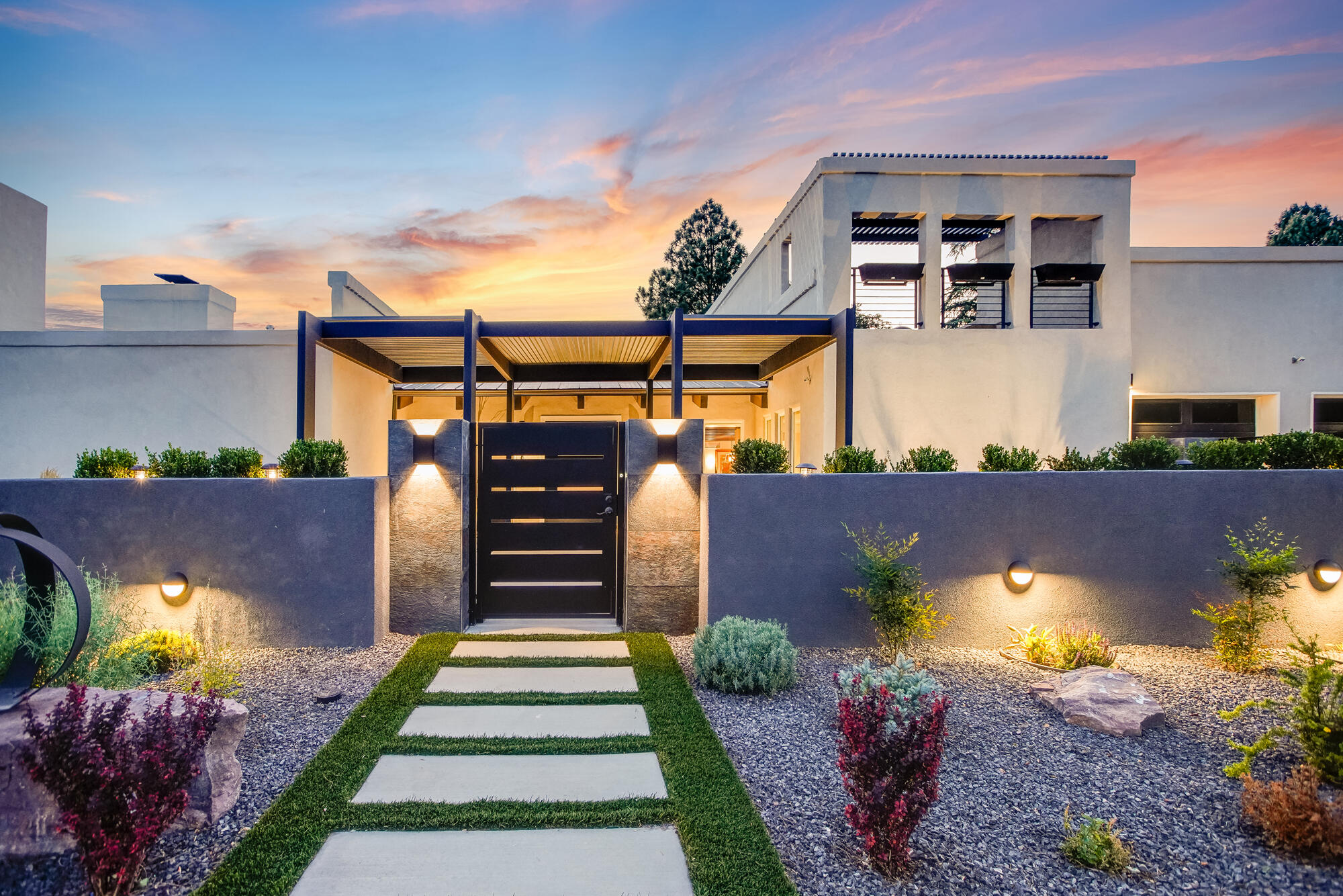 An Architectural Masterpiece in Altura Park. This stunning home overlooking Altura Park is a true architectural masterpiece. The five-bedroom, four-garage property features a private rooftop patio, a guest suite or second primary suite, and four additional bedrooms all with private baths. The chef's kitchen is equipped with double sinks, under-cabinet lighting, a kitchen island with pendant lighting, a massive island with seating for 5,  professional stove & a giant pantry. The great room has vaulted wood ceilings with spectacular exposed beams, 3 fireplaces, and entrance veranda with 15-foot steel beams. The primary bedroom has a wood-burning fireplace, a large closet & private bathroom with a huge separate shower & tub. The entire house is equipped with security doors and gates...