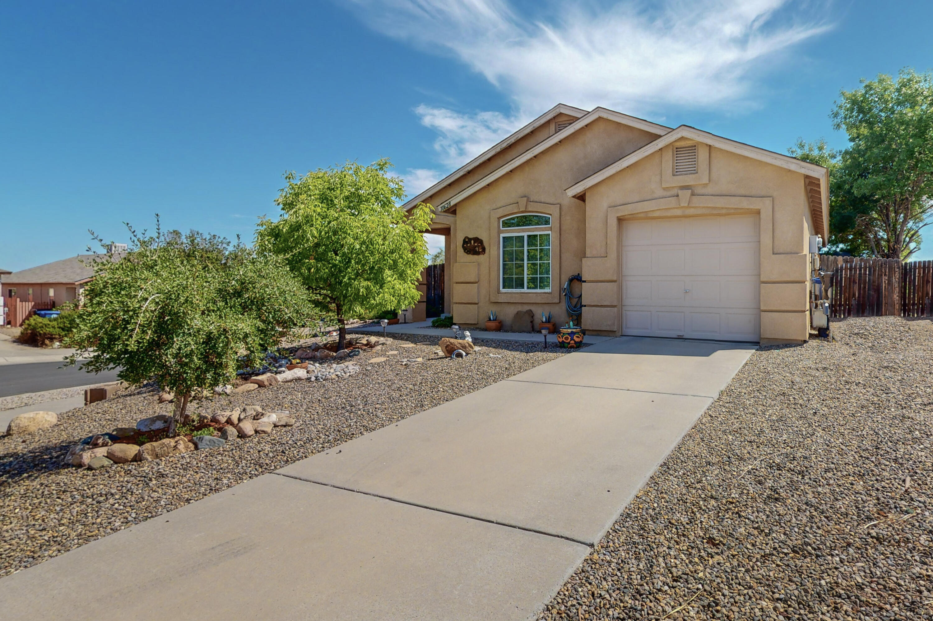 Beautiful and well cared for home in Paradise Skies! This one story home is situated on a corner lot and has a nice view of the mountains from the backyard! Home has vaulted ceilings, a large master bedroom with a full bath, a 2nd bedroom along with another full bath. Nice roomy kitchen with plenty of cabinet space, cozy living room and a wonderful completely landscaped backyard with a huge covered patio ! All appliances stay!  You will love the proximity to shopping, schools, restaurants, hospitals and westside communities.