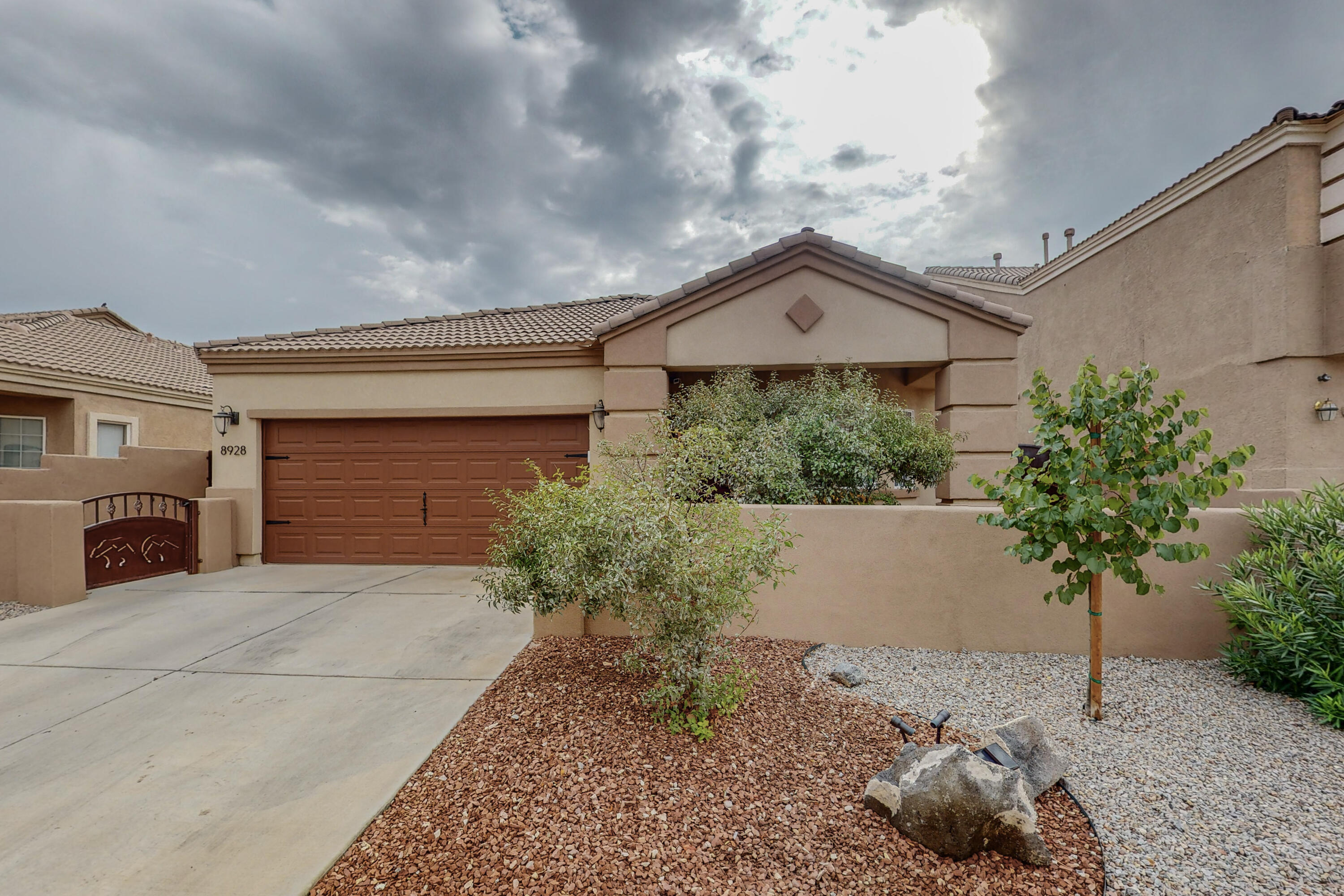Come see this REMARKABLE, GORGEOUSLY REMODELED HOME located in Santa Fe 2 at the Trails. This Stunning 3 bed/2 full bath has so many upgrades: SELLER OWNED Solar System, New Lennox HVAC System Central Heating/Refrigerated Air (2023) Whole House Synthetic Stucco (2021) Proline Water Heater (2022) The Renovated Kitchen is a Culinary Dream that boasts Granite, Deep Sink, Ducted Range Hood, $8K Blue Star Pro Gas Range, Sold Wood Cabinets w/ open shelving, Instant Hot Water, ECO Water Softener & Reverse Osmosis. Saltillo Tile throughout, Transom Windows, Remodeled Bathrooms, & so much more! Recent Backyard 6ft wall extension to the front w/new courtyard & 4 custom yard gates (2022) Indulge in your private backyard that was professionally landscaped w/ sidewalk extension & custom wood Pergola.