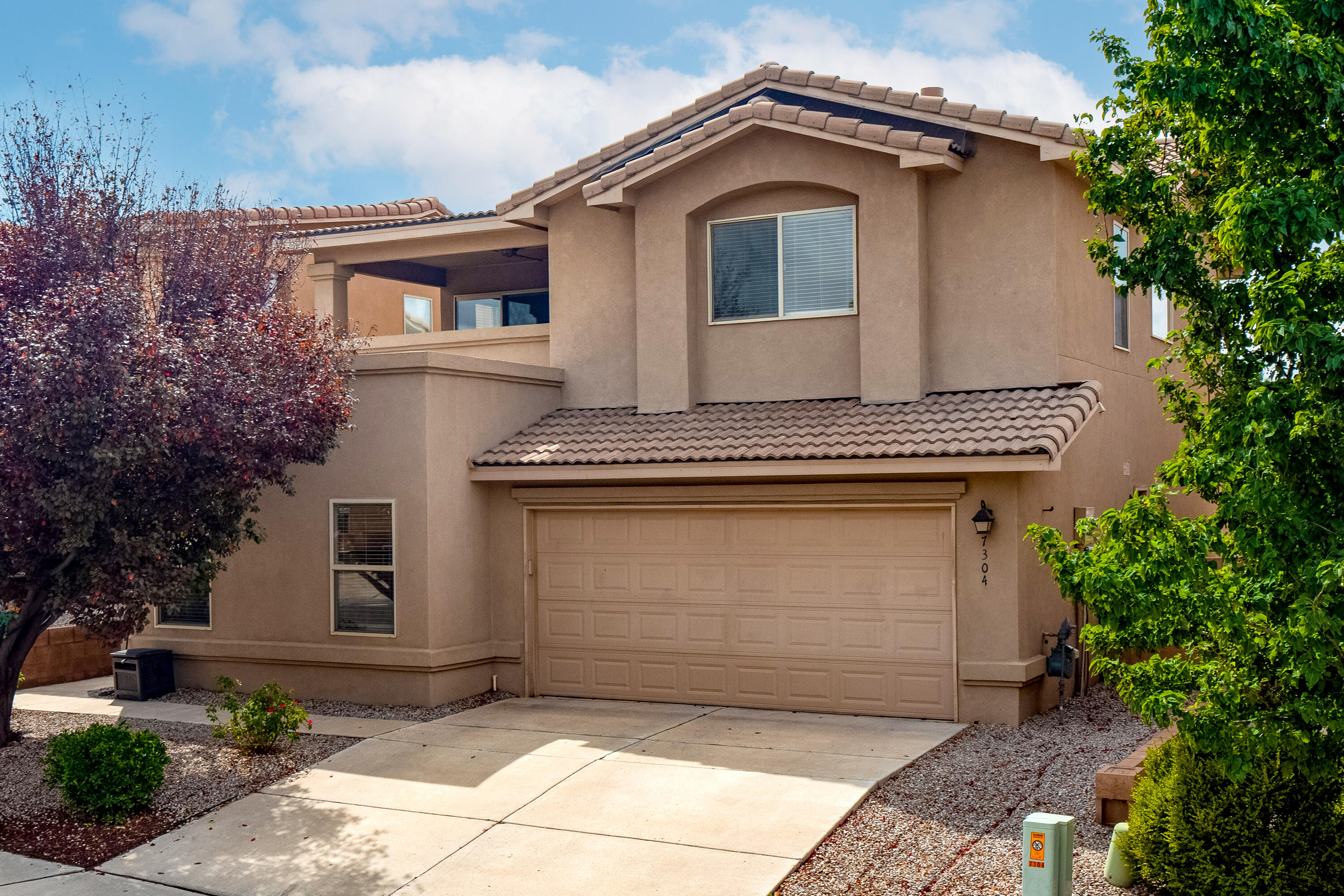 This is the home you have been waiting for in Albuquerque's most sought after school district. North Star elementary, Desert Ridge middle school, and La Cueva high school. The home offers updated laminate flooring, updated carpet, and fresh paint throughout the entire home. The kitchen is bright and open and has freshly painted cabinetry, updated granite countertops, and stainless steel appliances. On the first floor you will find a large great room with a gas log fireplace, the kitchen and dining area, a utility room and a guest bedroom. Upstairs there are 3 additional bedrooms including the large primary suite with a walk in closet and large en-suite bathroom. Stay cool with the brand new air conditioner just installed! Enjoy the convenience of this great location with nearby amenities!