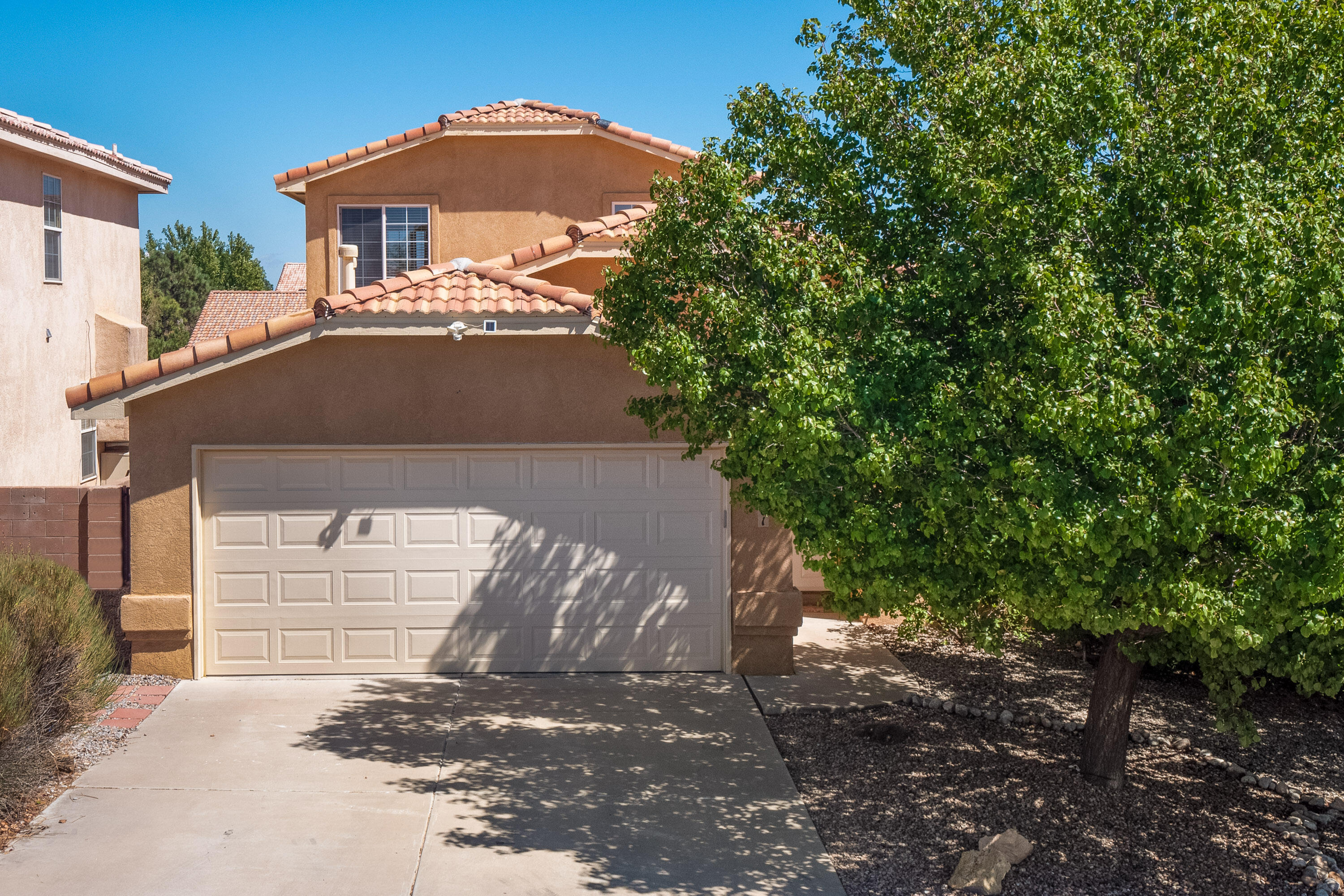 Beautiful corner lot home and on a cul-de-sac. When you enter you are greeted with high ceilings, natural light and the home has a great flow to it. 3 bedrooms downstairs and a private primary bedroom upstairs with balcony. Primary bathroom has 2 separate vanities, separate shower and garden tub. Flex space/ office off living room. A few newer features include landscaping (turf) in backyard, heating/Refrigerated air 2020, Primary bathroom flooring put in 2023, Primary bathroom new vanity, dishwasher 2019. The home also has a water softner. Enjoy cooking in the spacious kitchen using the 5-burner gas range. The kitchen opens up to the backyard for easy entertaining. The front yard is fully landscaped and complete with auto sprinklers and bubble drip. The back yard also has auto sprinklers.