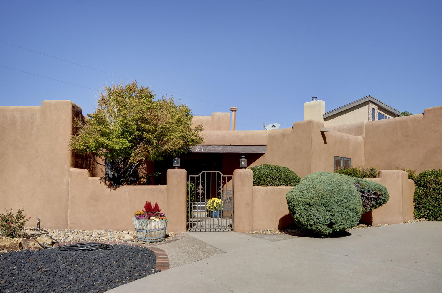 This gem is on a private lot that shares a wall with only one neighbor. Both city and mountain views with spectacular sunsets. Nearby open space, foothills trails, walking paths, playgrounds, bike trails and dog park. Front courtyard leads to entryway. So many updates. Open concept floor plan which maximizes views. Luxury vinyl floors. Pella windows and doors. High end gas fireplace. Wet bar. Remodeled kitchen w/new appliances, including induction cooktop. Marble countertops. High end soft close cabinets. 2 walk in closets off Primary bedroom. Lots of storage. 2 water heaters. Refrigerated air. Owned solar, 27 panels generate over 10,000 kWh per yr which results in $8 monthly electric bills. Large storage sheds in backyard. Windsor shutters, come & see! There are steps to LR, DR, & garage