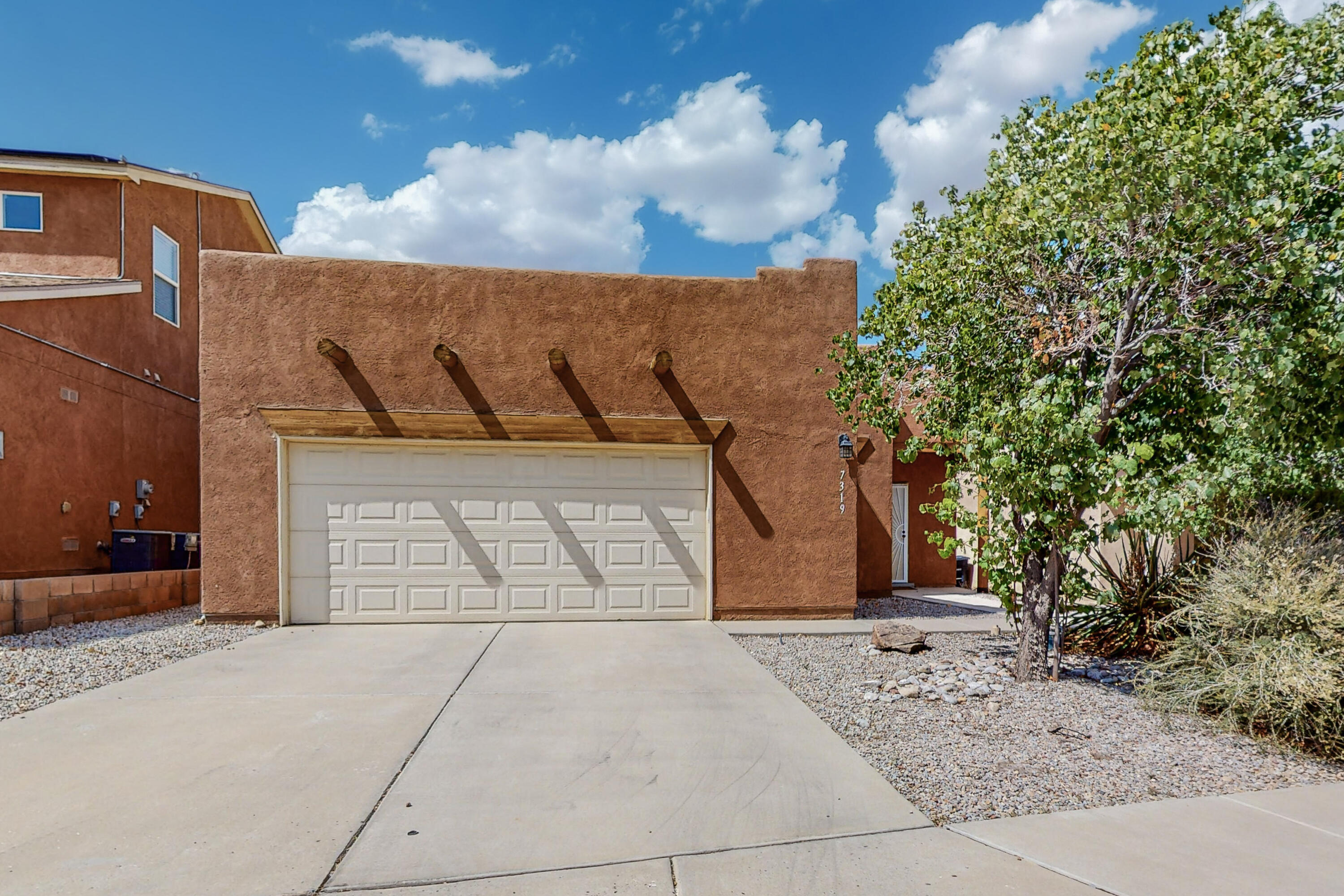 Motivated seller. This lovely home in The Trails subdivision is perfect for those looking for a move-in ready single-level home. It features an open floor plan with a spacious living room complete with a cozy fireplace. The kitchen is equipped with stainless steel appliances, ample counter and cabinet space, a convenient pantry, and an adjoining dining area. The primary bedroom is separate from the other three bedrooms and boasts an en suite with double sinks, a garden tub/shower combo, and a walk-in closet. There is a second full bathroom located next to the other three bedrooms. Laundry room with washer and dryer, and oversized garage with overhead storage. The property is situated across from an open space area with a walking trail. Transferable Roof Warranty