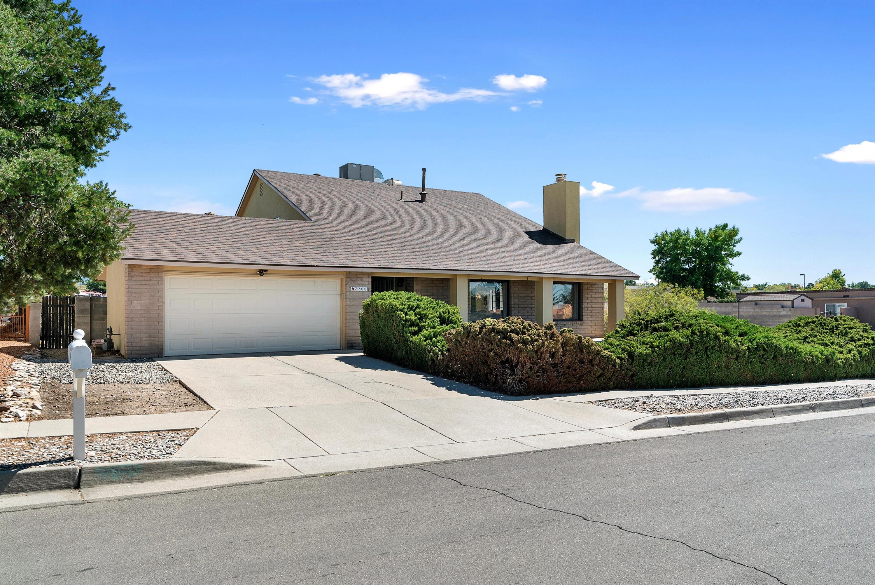 This stunning two-story house is located in the desirable Loma Del Norte subdivision in Northeast Albuquerque. This spacious home offers a generous 2,577 square feet of living space and features three bedrooms, three bathrooms, and a two-car garage, unobstructed view of the Sandias, and backyard access. The architectural design of this property includes vaulted ceilings with exposed beams, adding a touch character to the interior.  The open floor plan on the main level connects the living room, dining area, and kitchen, making it an ideal space for entertaining guests. The three bedrooms are located on the upper level, offering privacy and tranquility. Come and take a look!