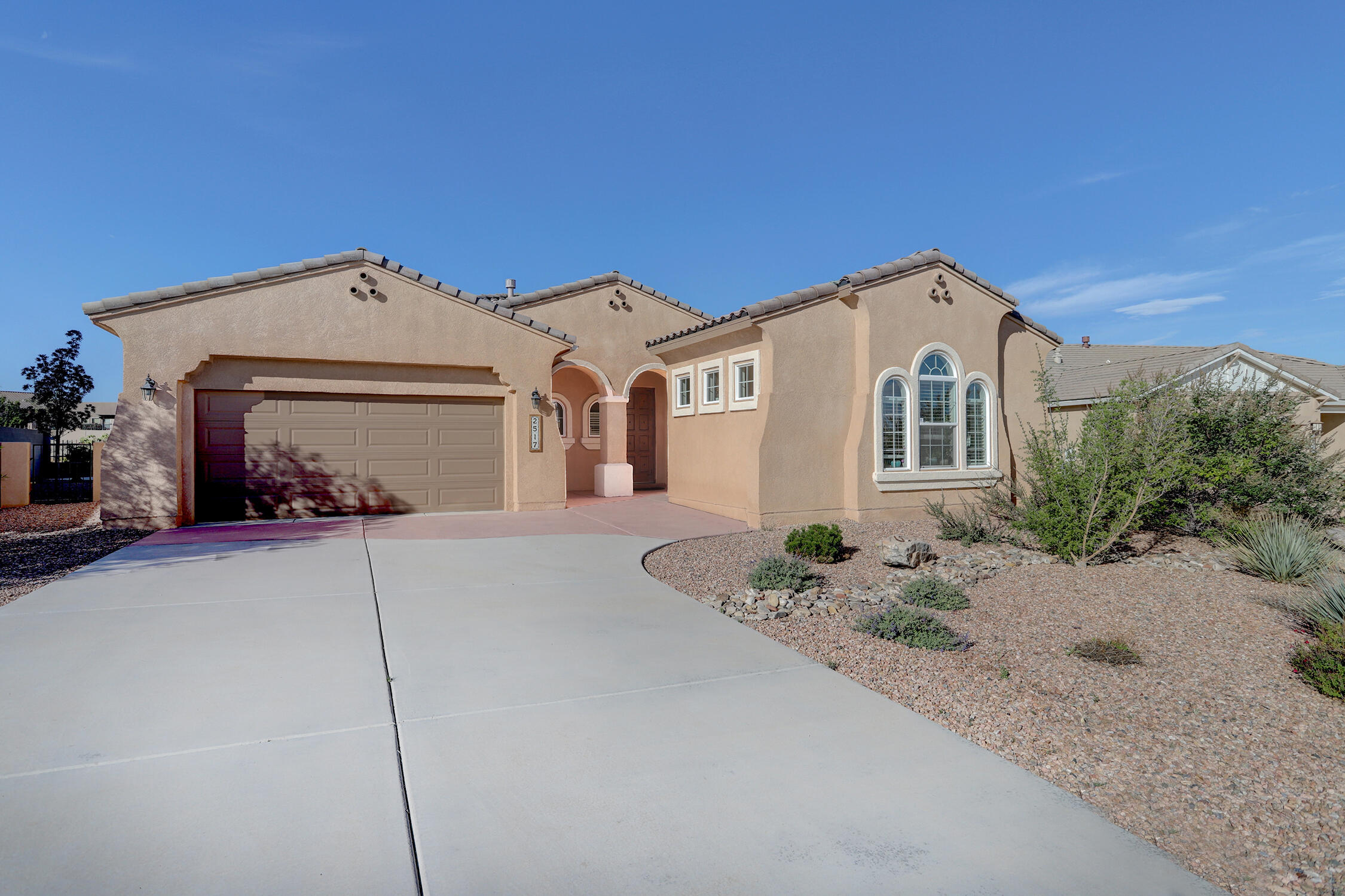 Award wining single story home on extra large landscaped lot with Views of the south mesas and the Sangre de Cristo & Jemez mountains. Home offers 2575sqft of open living plan and 4Bd 3bath One with separate entrance in needed for home office 2CG. Great natural light your plants will love it! And wait till you see the primary bath it's a WOW! Granite kitchen counters with lots of cabinet storage plus walk-in pantry. Call your Realtor today for showing.