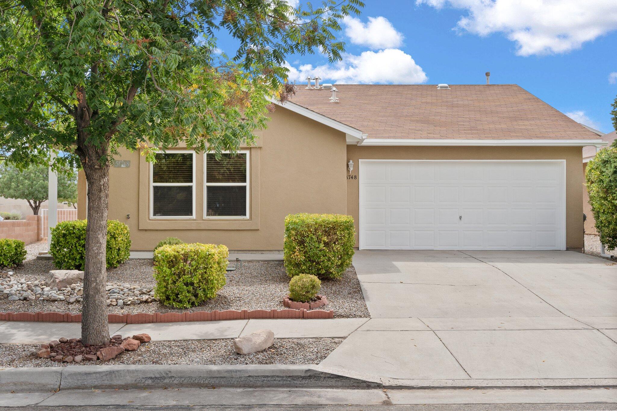 Lovely, move in ready home, awaits its new owner! Seller has done many improvements on this light bright & open great room floor plan. Improvements include the entire interior professionally re-painted, & all exterior trim just completed. All new carpet in bedrooms. New light fixtures & new blinds throughout. Two full bathrooms with updates & new toilets. Kitchen appointed with brand new beautiful Stainless steel farm sink, & all new stainless-steel appliances, which includes a gas stove, microwave, & refrigerator. Brand new washer & dryer also stays. Large ceramic tile in great room, kitchen & bathrooms. Refrigerated Air! Spacious two car Garage with painted floor. Situated on a spacious corner lot with covered patio. One block from park, & across from restaurants, shopping, etc.