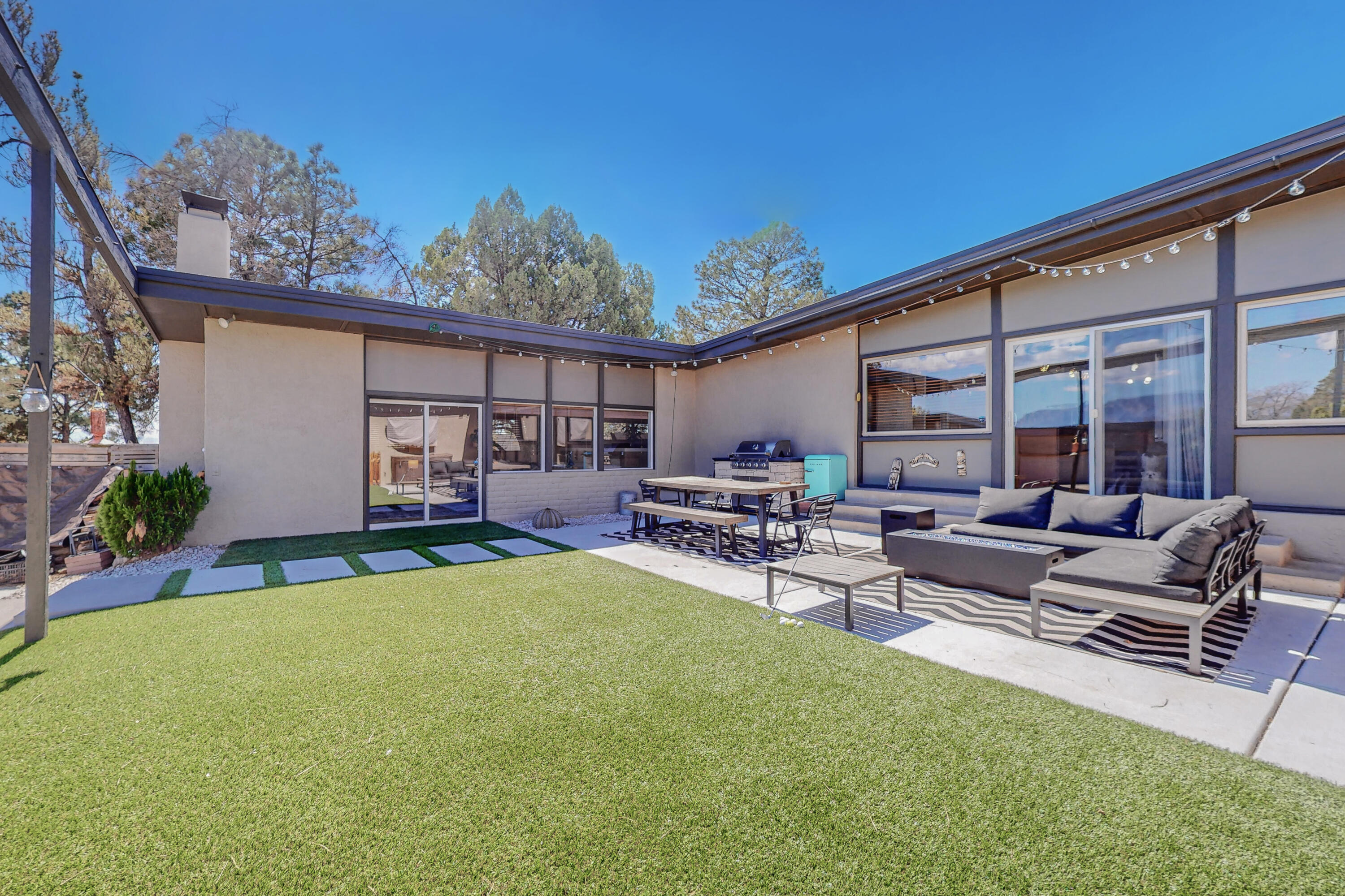 Mid Century Masterpiece with Modern Updates and Mountain Views.Nestled adjacent to the picturesque Paradise Hills Golf Course, this stunning home has been meticulously updated and offers the perfect blend of classic architectural design and contemporary amenities. Boasting 3 bedrooms, 2.5 baths, an office, 2 spacious living areas, and a host of features that make it an entertainer's dream, this property is a rare gem. 7-car garage complete with a mechanics pit perfect for car enthusiasts, space for RV parking, backyard with putting green and breathtaking mountain views make it a serene and relaxing retreat ideal for outdoor entertaining.Don't miss this rare opportunity to own this beautifully updated home offering the perfect balance of style, function, & location.