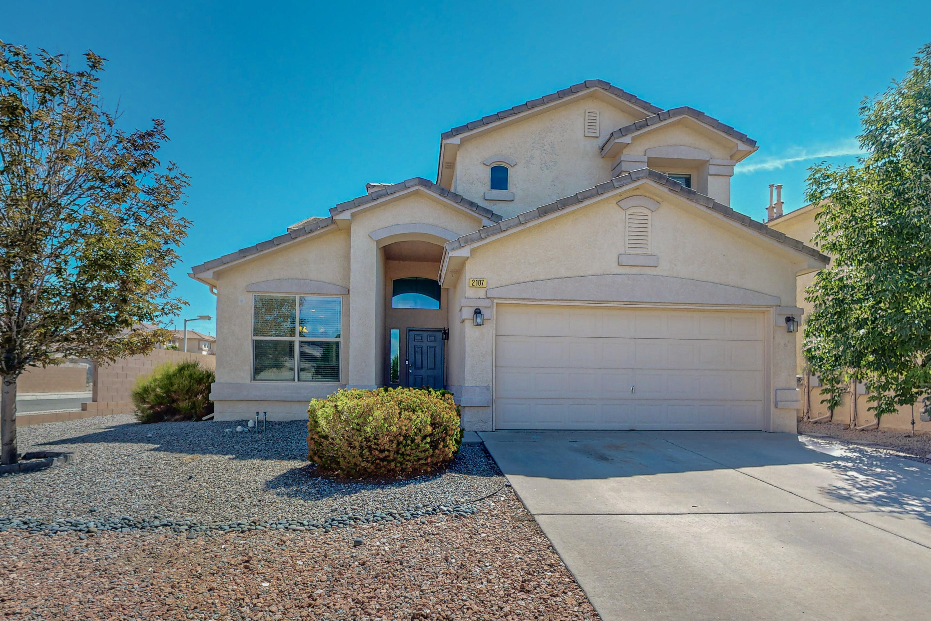 Welcome Home! To one of Rio Rancho's most desirable subdivision of Toscana at Cabezon. This community is located conveniently nearby walking trails, parks, schools, shopping center, and much more.This 2 story corner lot home features high windows for natural light, dining, kitchen with stainless steal appliances, and breakfast nook. Living room invites you to set the ambiance with a gas log fireplace and high ceilings. Primary bedroom with separate garden tub, shower, double vanity, and walk-in closet. Half bathroom, under the stairs closet are also located on the main floor. Upper lever holds an open loft with a balcony, Full bathroom and two spacious bedrooms with walk-in closets! Backyard is ready to host your fall gatherings underneath the Gazebo.