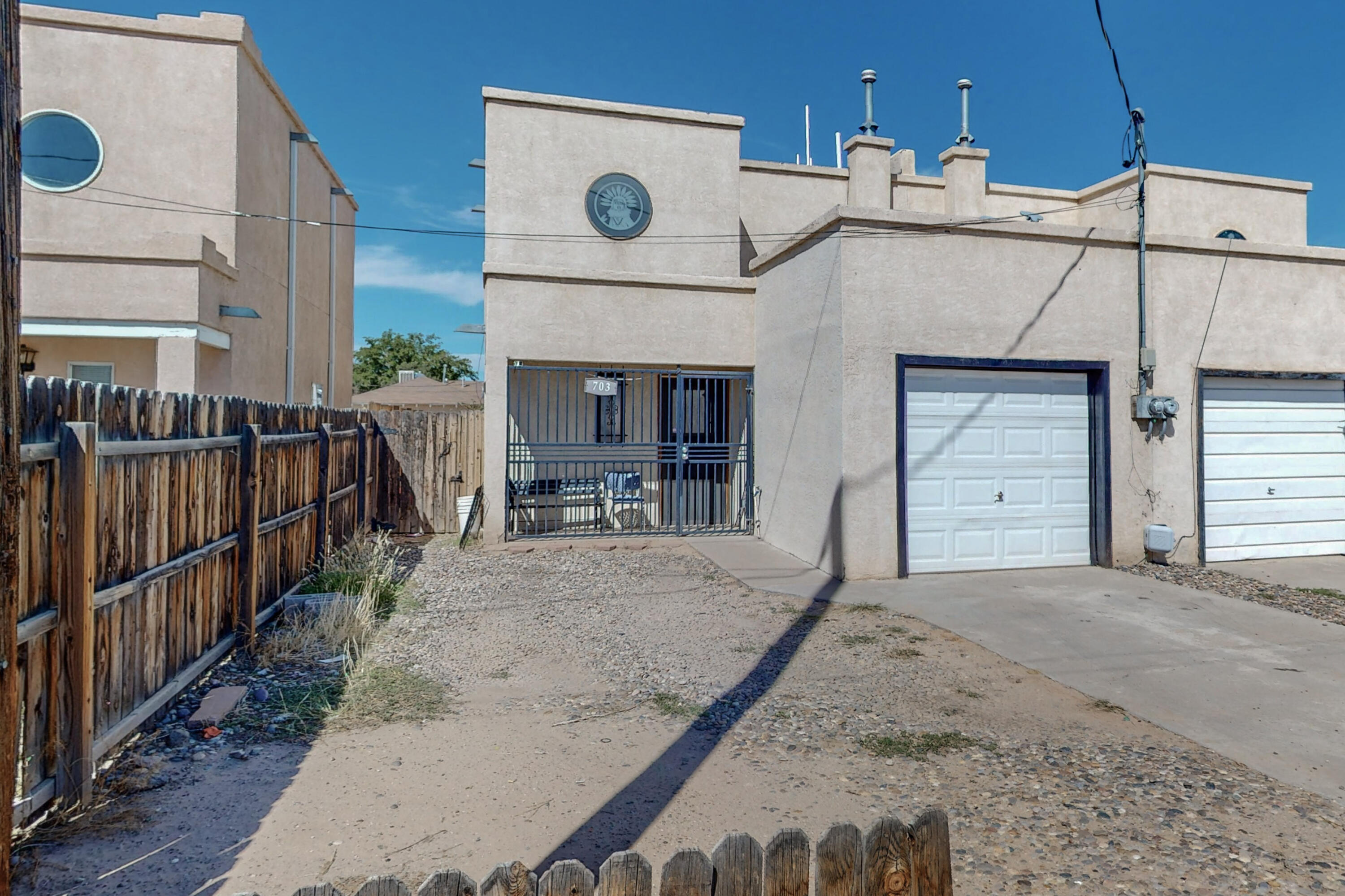 Cute north valley townhome! This home is conveniently located close to shopping I-40 and downtown.Home has a cute open floor plan. Home has laminate flooring throughout. Water heater replaced in 2019. Furnace replaced in 2022.