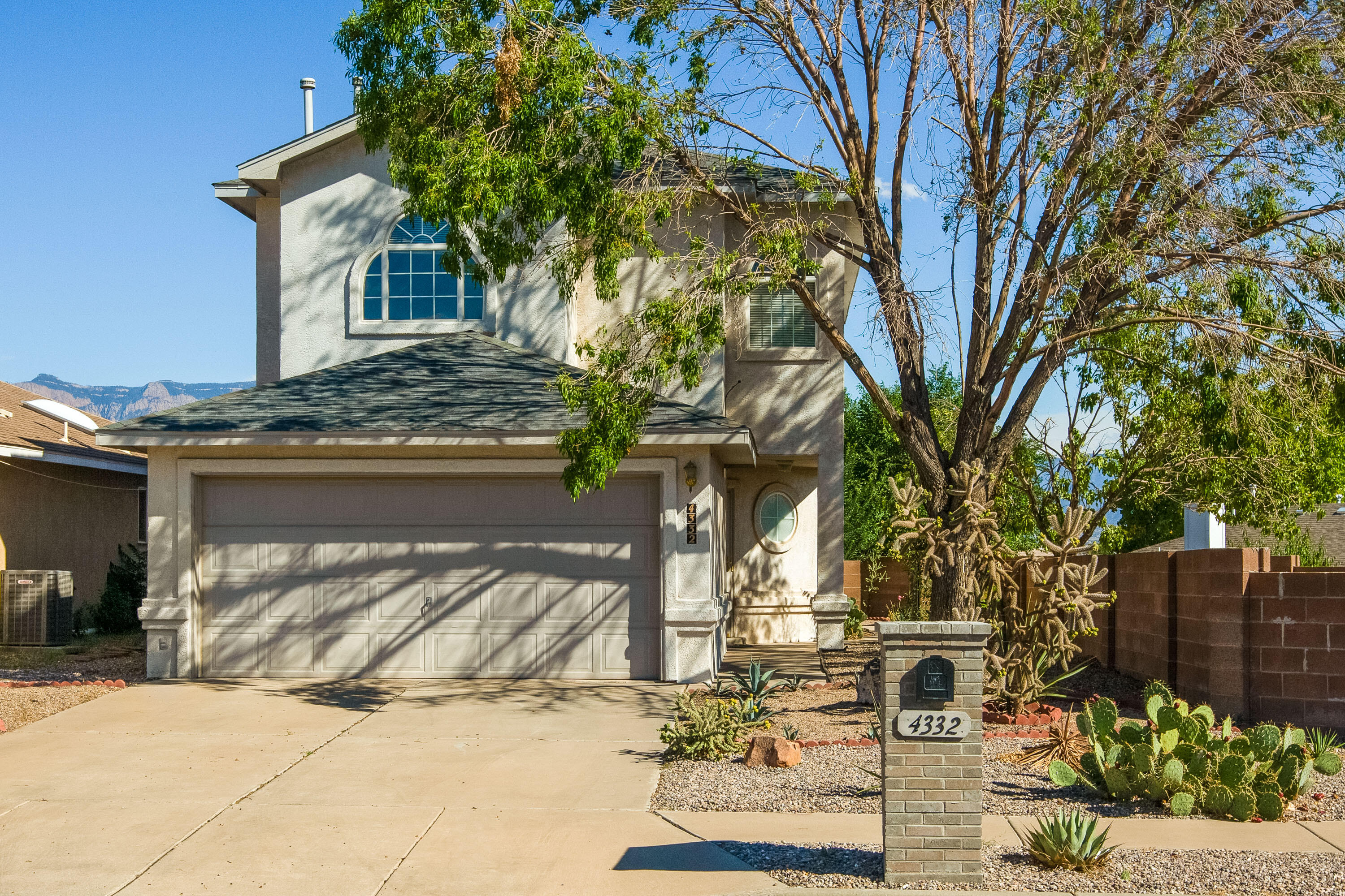 Two-story Home Built by Fuller Homes Located in a quiet Neighborhood.  Three Bedroom (all upstairs) Nice living area with a fireplace open to the kitchen with island and ample cabinets and cooking space, Breakfast nook with lots of light and windows. Upstairs enjoy a 2nd living area and Primary suite with a balcony that has views of the Sandia Mountains. The extra large lot has many possibilities.  A Great Place To Call Home!