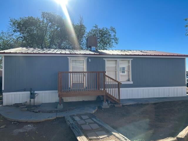 Mobile home and lot are located in an established neighborhood. Located in a cul de sac minutes from intel, grocery store, shopping, dining and more. Property is NOT on a permanent foundation. 21st Mortgage may be able to finance www.21stmortgage.com.