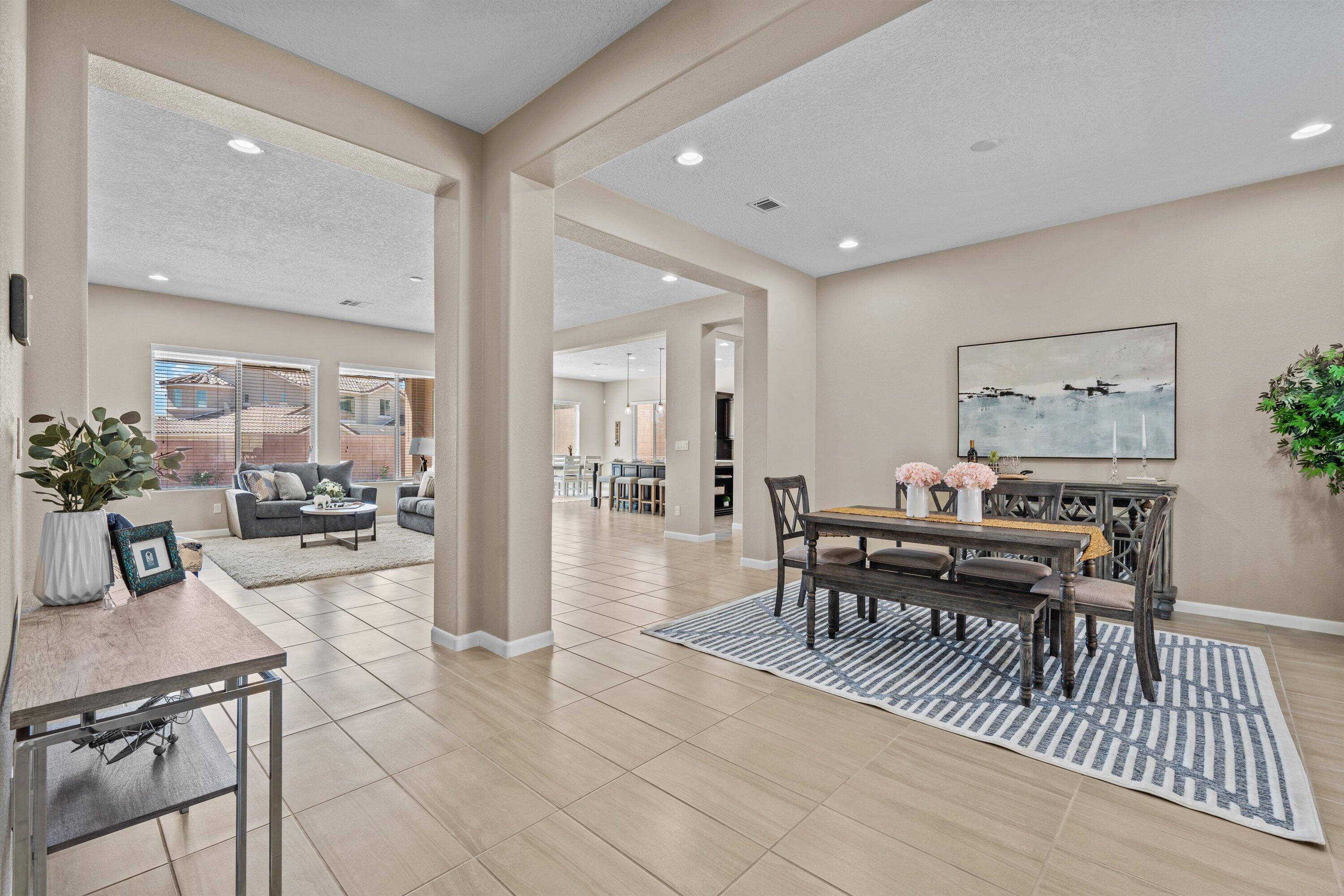 Welcome to the exquisite Patagonia floorplan, nestled within the Montecito Vistas community. Beyond the entry gate, be greeted by a charming courtyard that sets the tone for the elegance that lies within.Inside, find a well-designed layout with an open floor plan, a spacious kitchen featuring modern appliances, quartz island, and ample storage space perfect for entertaining. The primary suite offers a framed walk-in shower and a custom closet.With four bedrooms in total, this home offers versatility for every lifestyle. You'll discover a multi-generational suite, a flexible room, and a dedicated office space, catering to your specific needs.The allure of the outdoors awaits you in the landscaped backyard with an inviting outdoor kitchen. Live in luxury and comfort!
