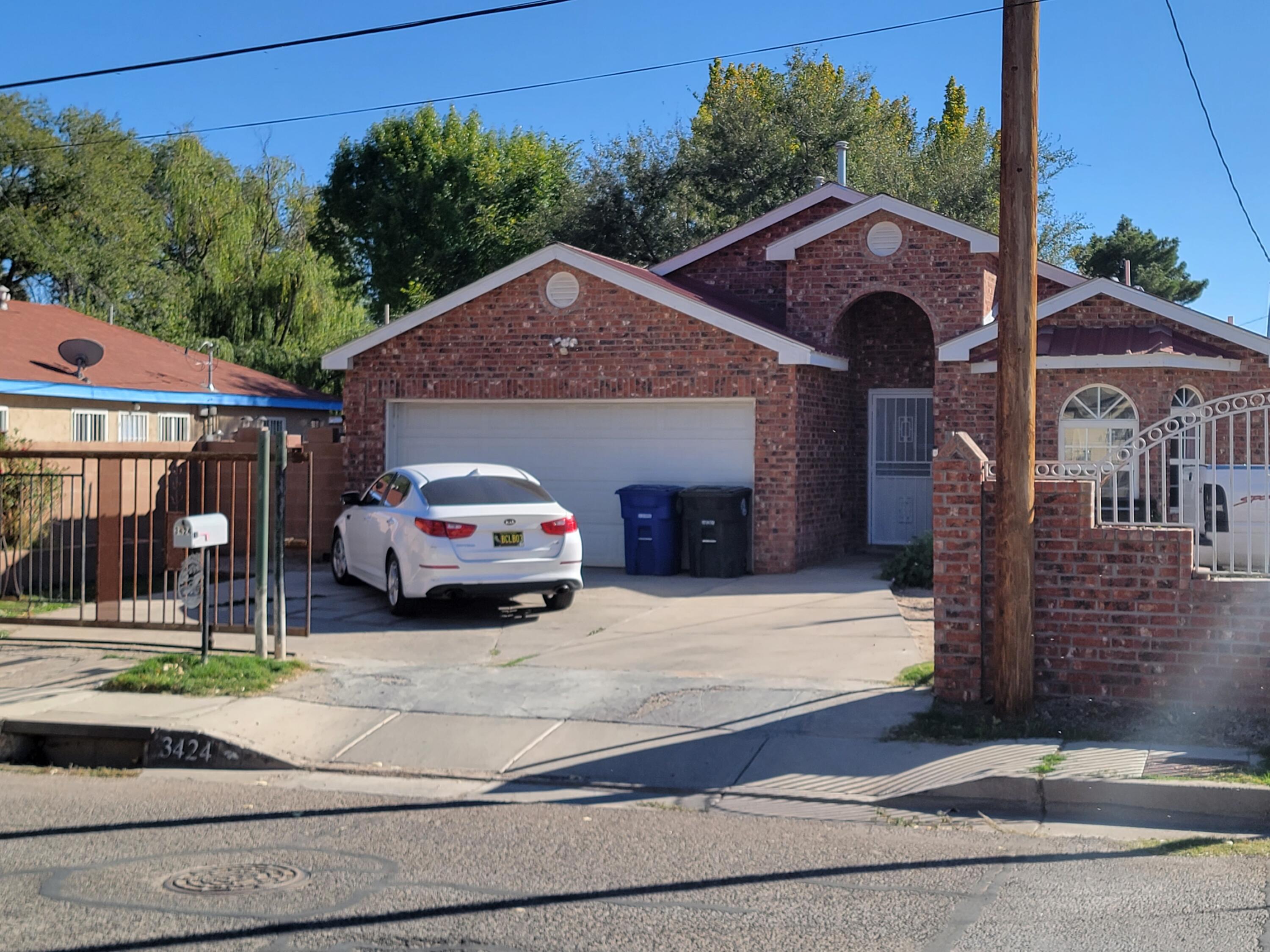 Nice custom built house in a quiet neighborhood. All brick facade, high ceilings, newer heating and cooling units. 3 Bdrs 1 3/4 baths. venetian plaster finish in the entry way !! Spacious kitchen, and large bedrooms. Nice backyard with access to the side street.