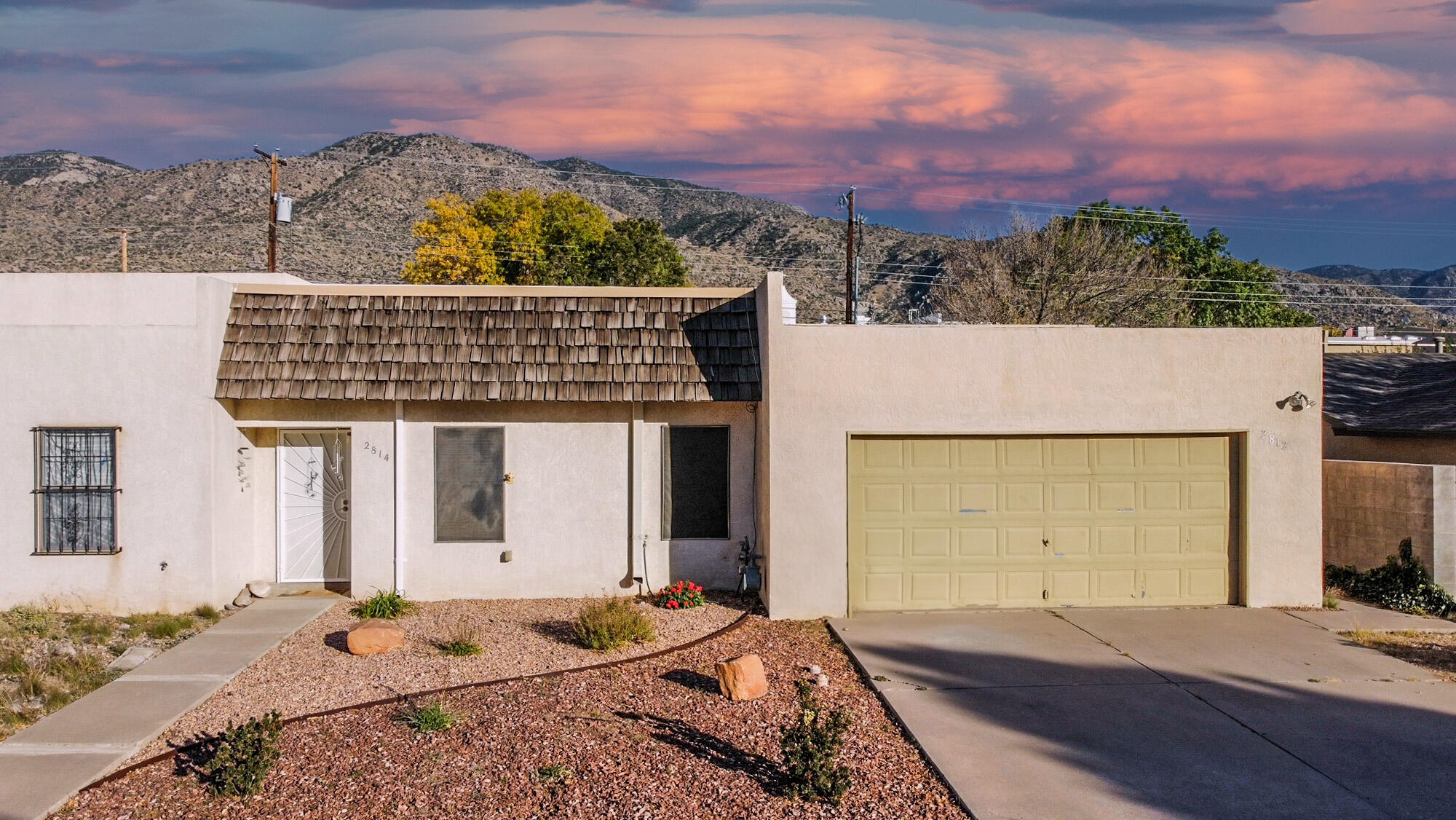 This charming townhome is move in ready! Tall ceilings give a welcoming vibe offering warmth and natural light in the living area. This home includes a spacious master closet, a private backyard with a covered patio for relaxing or entertaining a guest. Location, location, location!  This home is close to shopping, restaurants, the Foothills Trails, schools and quick access to I-40. Walking distance to Lynwood Park. Newer refrigerated air. No association fees. Great rental or airbnb. Come take a look today!