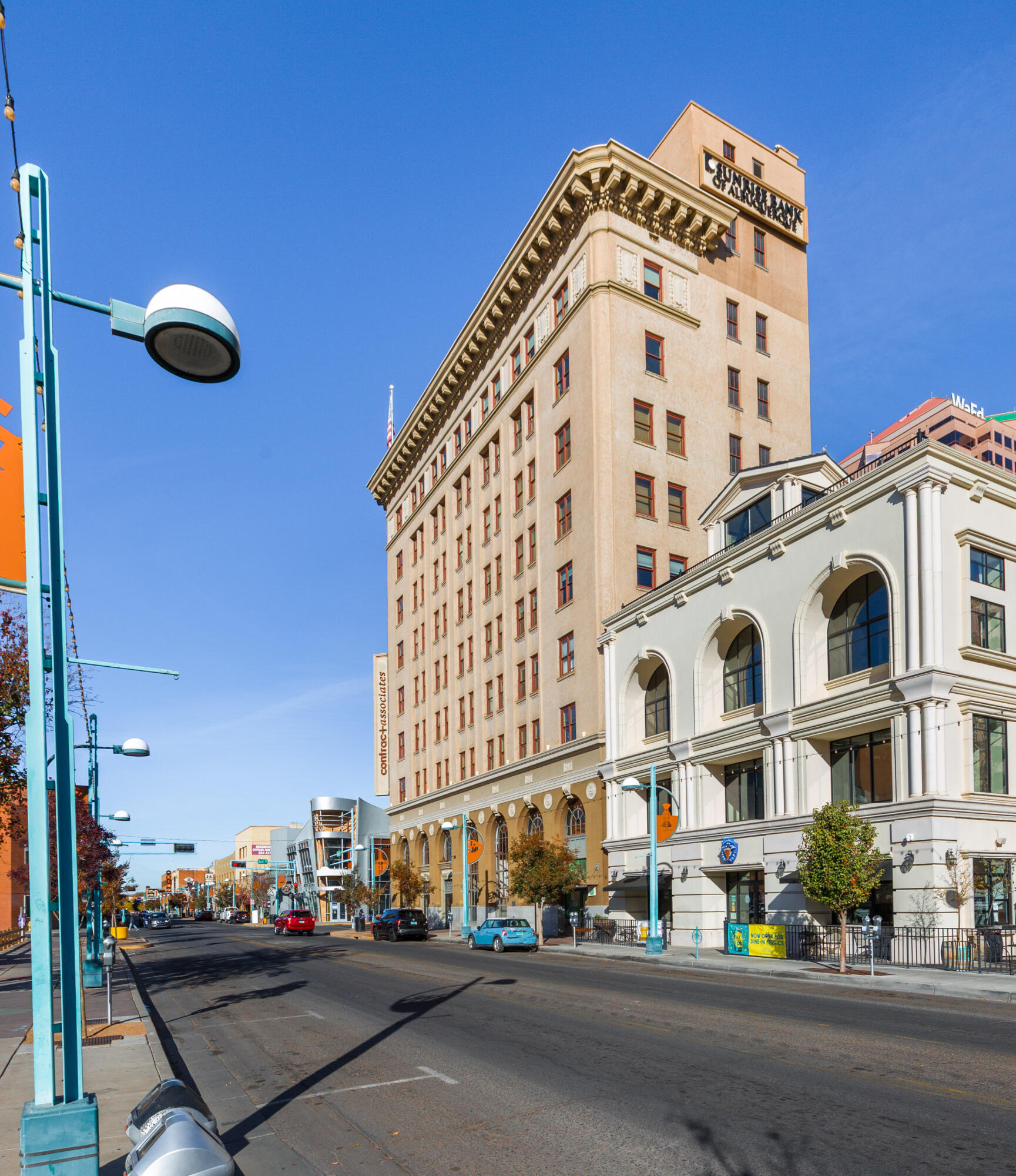 Albuquerque's finest downtown living at The Banque. Come claim your place in this astonishing national historic building located on the famous Route 66. The pristine, fully furnished 2 story, 1 bed and 1.5 bath condo, offers a spacious layout. The 1st floor and bedroom offer views of the west side of town, while the loft and private balcony on the 2nd floor offer views of the breathtaking Sandia Mountains. The full bathroom features a jetted tub and a separate walk in shower with built-in speakers. When you want to get a breath of fresh air, you can head to the rooftop where you will find 360-degree scenic views from the heart of the city. The 3rd floor of the building presents an gathering area. Nearby you can find entertainment, restaurants, markets, art walks, gyms and other attraction