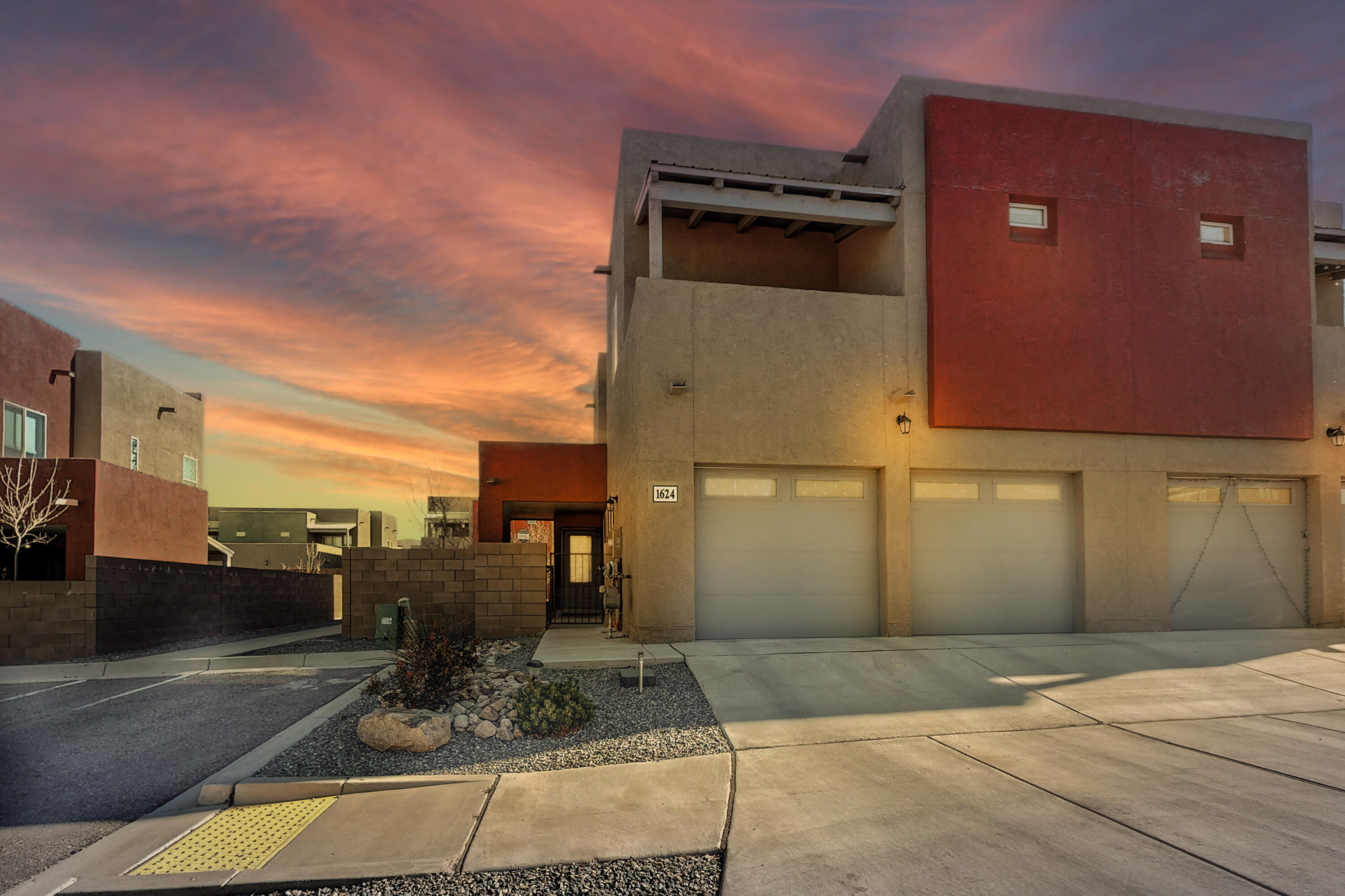 Home shows like a model! Immaculate and well maintained townhome move-in ready. The backyard is an entertainers dream! Completely done with firepit and seating, grass, brick wall and drip system throughout. This home has many upgrades: granite kitchen countertops, stainless steel appliances, views of the Sandias from the living room, custom sink and counter in downstairs 1/2 bath. Upstairs offers a split floorplan with the primary on its own wing with ensuite large bathroom and walk-in closet. The laundry is upstairs and the washer and dryer stay. You are going to love this move-in ready home! Close to Kirkland AFB and Sandia Natl Labs.