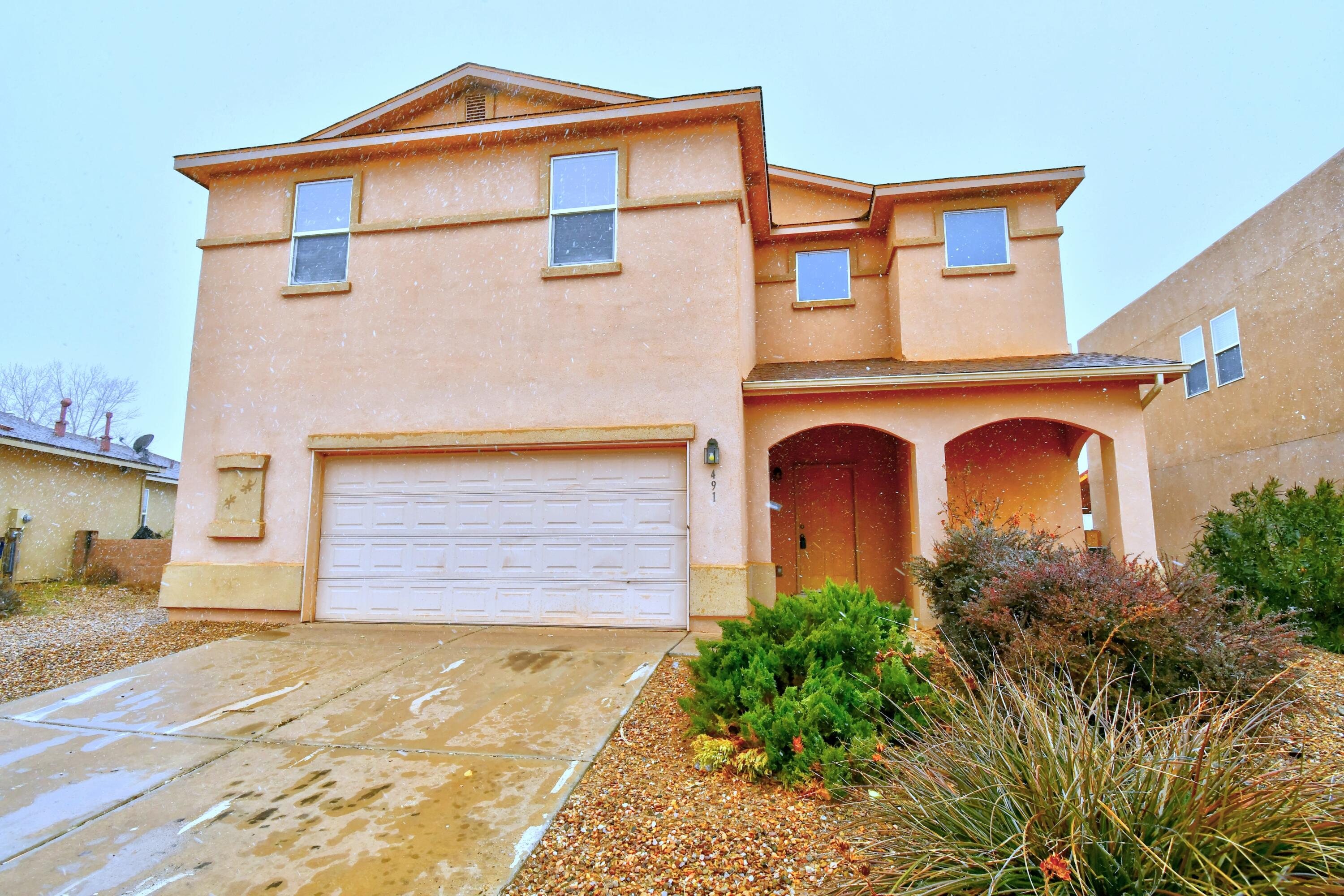 Priced to sell! Big 4 possibly 5 bedroom home with 2 living areas. Very livable floorplan. Kitchen offers solid surface counters and stainless appliances. Large back yard with a covered patio. This desirable neighborhood is less than 20 minutes to Albuquerque.