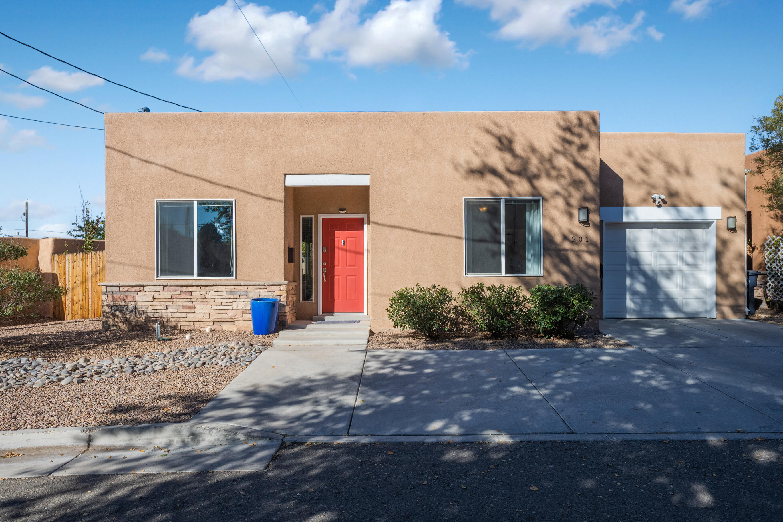 Great opportunity in downtown Albuquerque, rental potential! Updated to meet today's lifestyle, this exquisite and charming single family home comes completely upgraded with two luxurious and modern bathrooms.  This home boasts a coveted prime location between Downtown, Albuquerque and Old Town. Nestled in the prestigious location minutes from the Albuquerque Country Club,  provides access to Tingley Beach, ABQ Biopark and endless options for dining, shopping and access to downtown businesses. The floor plan is flexible, with one bedroom functioning as an office or bedroom, and an open concept kitchen that opens up to the spacious living room. Enjoy the oversized backyard ideal for outdoor entertaining.