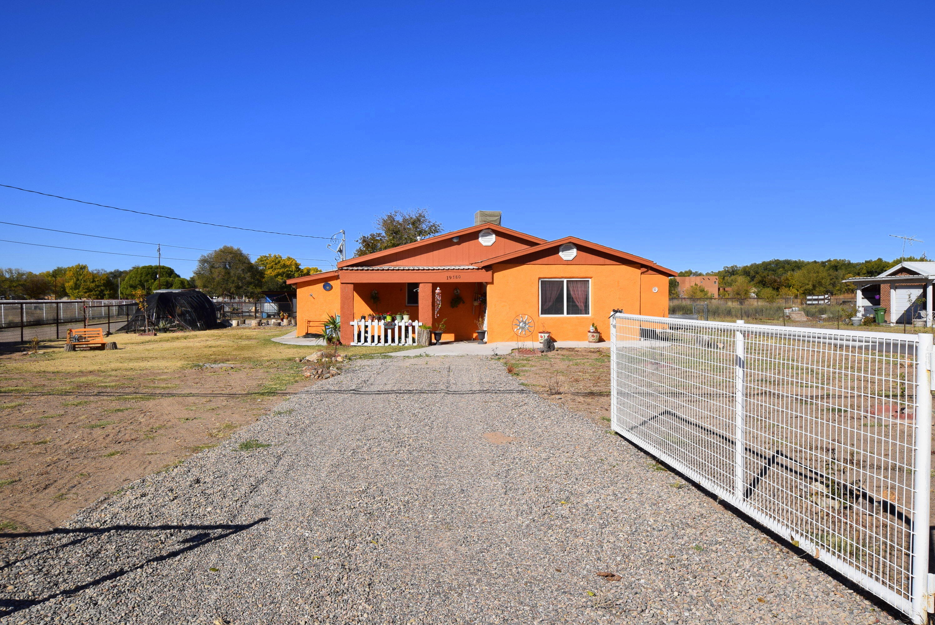 This home is located on 1.34 Acres with lots of expansion potential.   It has an unfinished unattached mother in law suite,   Large open spacious kitchen   including 2 bedrooms, possibly 3 with 1 bath.   Outdoors living area on 1.34 Acres.  Bring your horses, cows, goats etc.